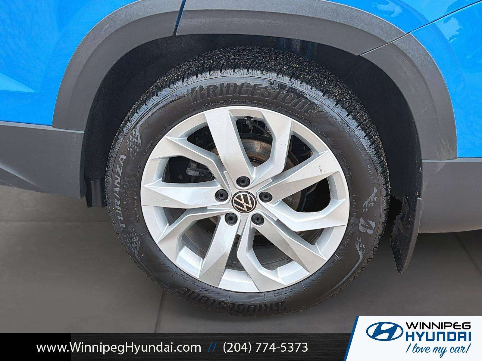 used 2022 Volkswagen Taos car, priced at $24,000