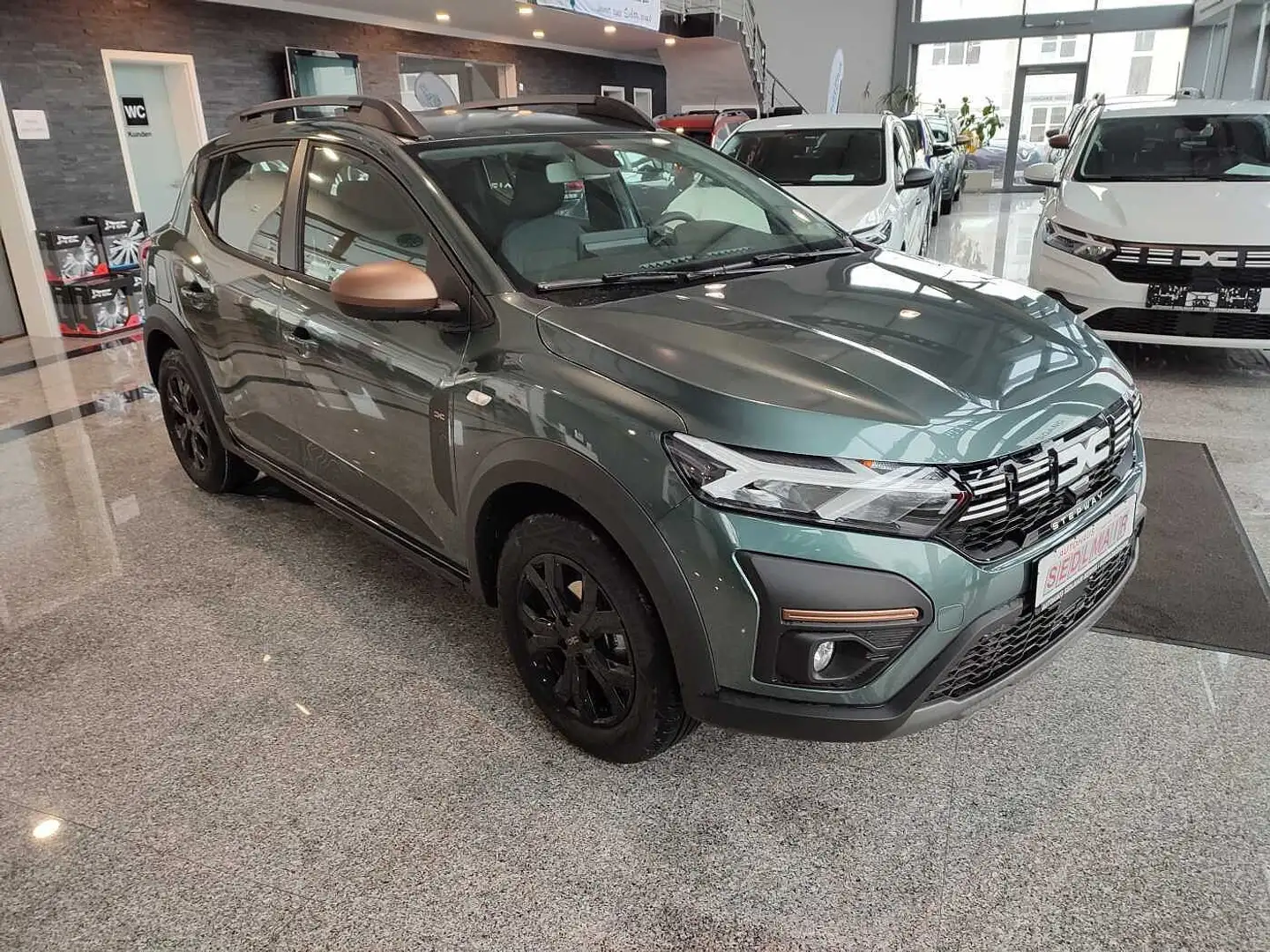 Dacia Sandero Stepway Extreme TCe 90 CVT/WKS Grün - 1