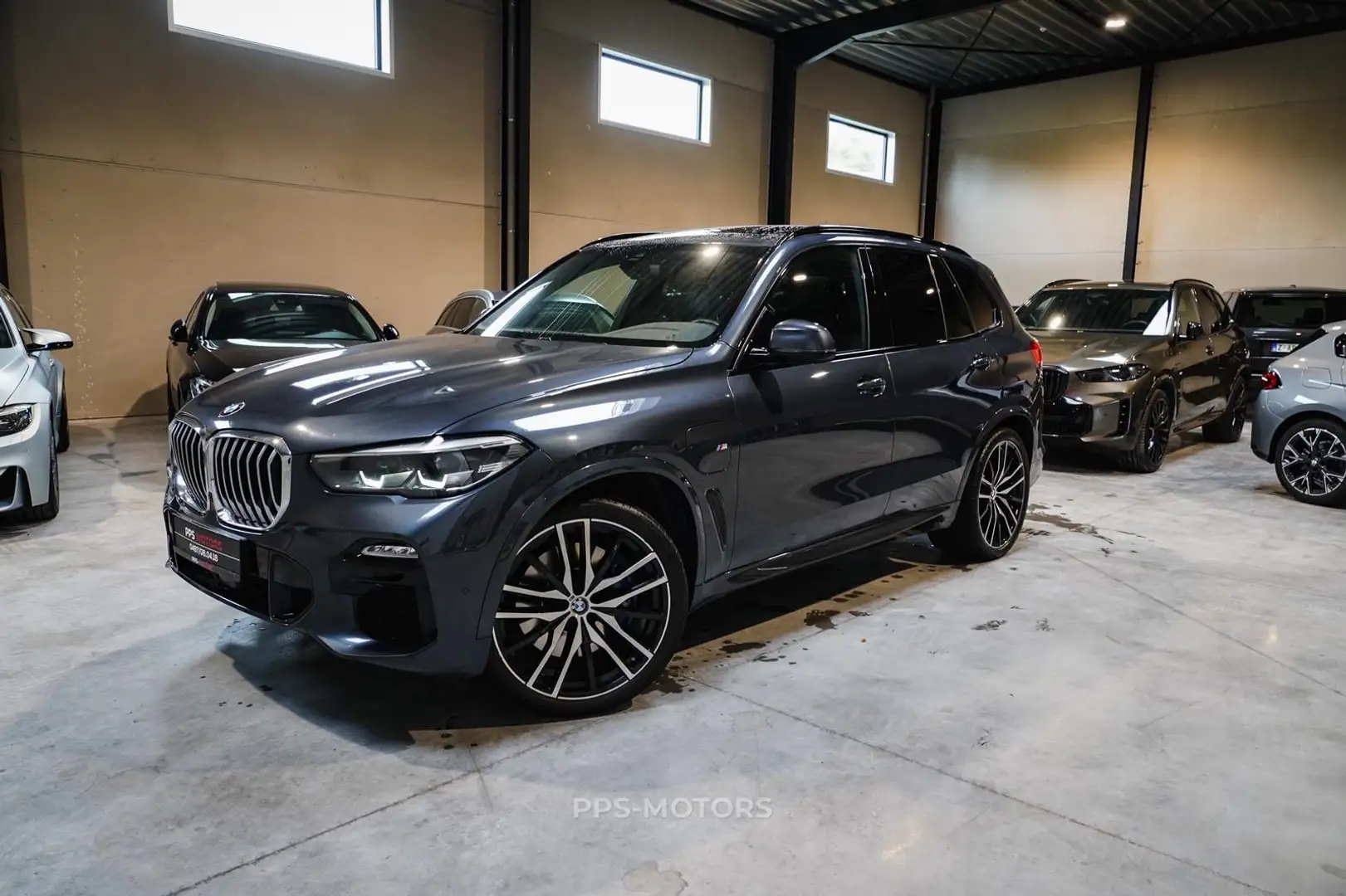 BMW X5 xDrive45e M Pakket Pano Head up BTW Blauw - 1