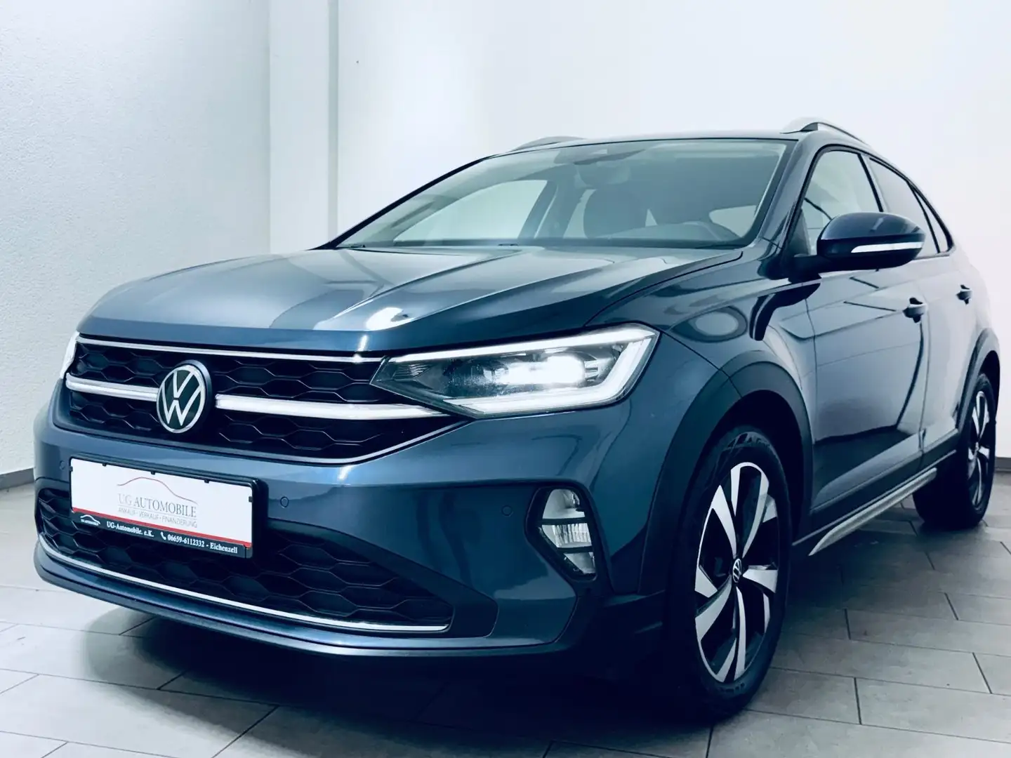 Volkswagen Taigo Style 1.0 TSI * Anschlussgarantie 04/27 * Grau - 1