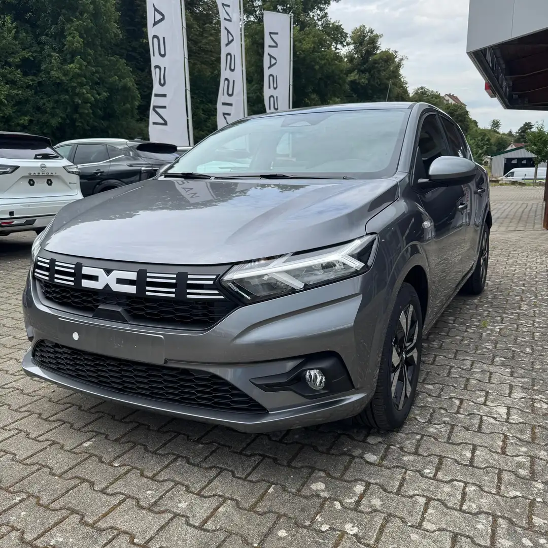 Dacia Sandero III 1.0 TCe 90 Expression/SHZ/Kamera 67 kW (91 ... Gris - 1