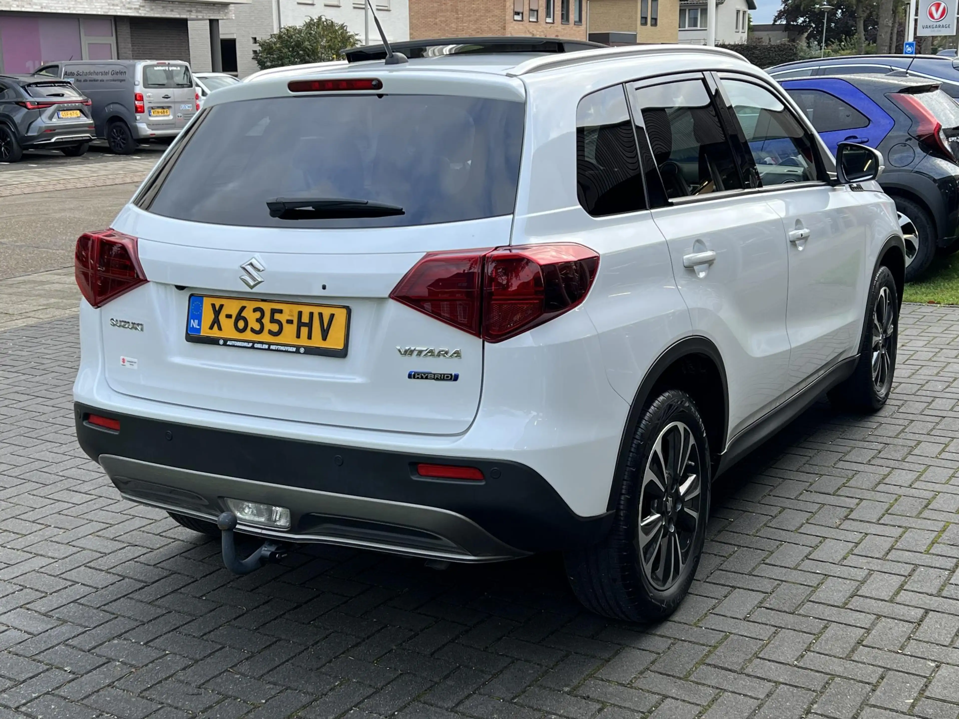 Suzuki Vitara 1.5 Hybrid Style | Trekhaak, Panoramadak, Dodehoek — photo 10