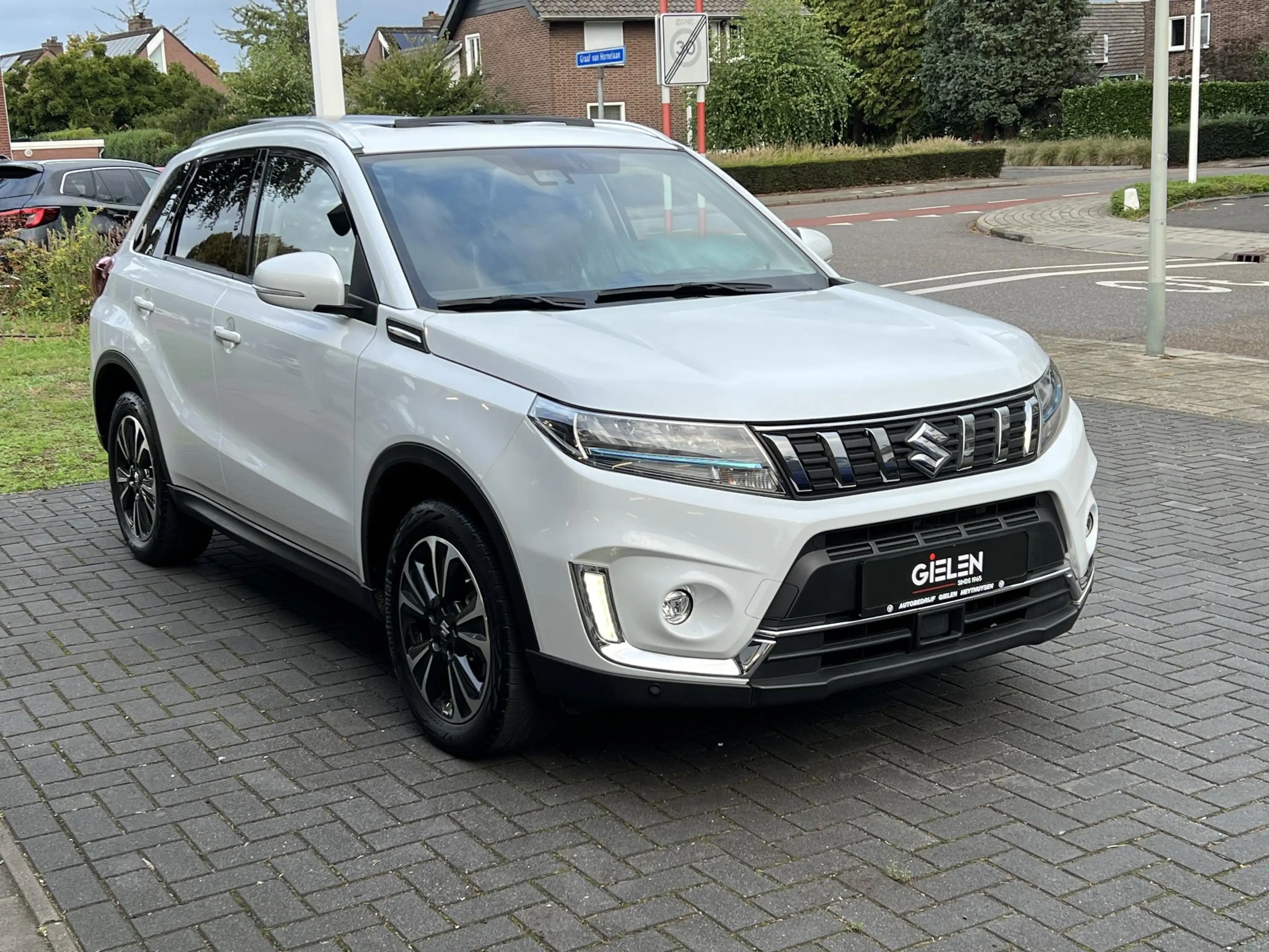 Suzuki Vitara 1.5 Hybrid Style | Trekhaak, Panoramadak, Dodehoek — photo 9