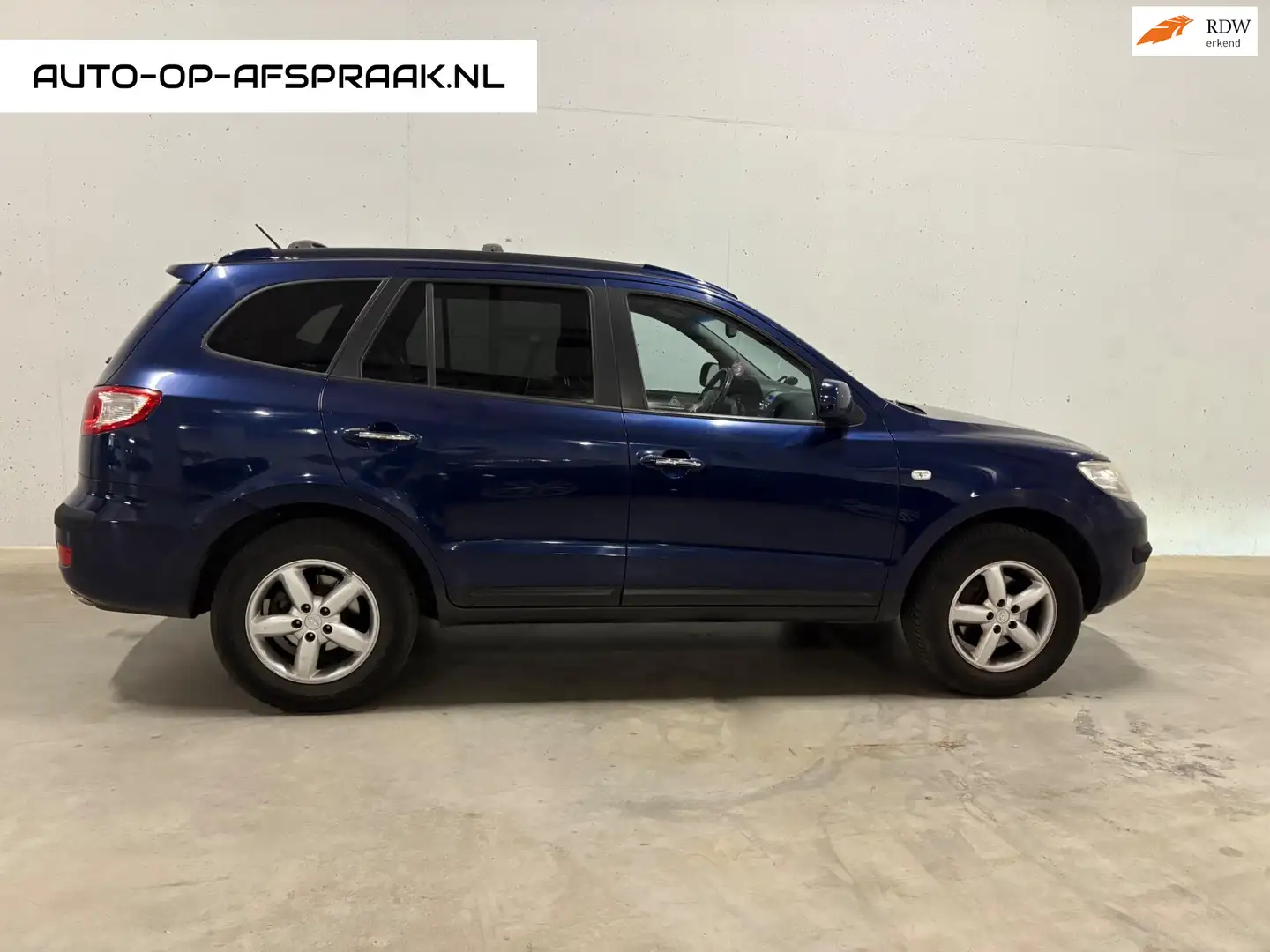 Hyundai SANTA FE 2.7i V6 Style 7p. Leer Trekhaak Clima APK NAP Bleu - 1