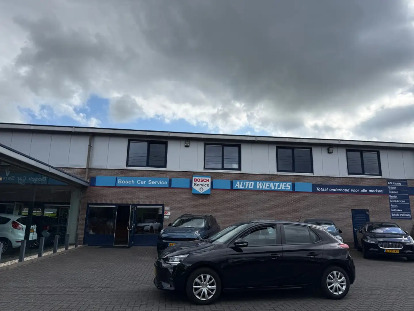 Opel Corsa 1.2 Edition 5-Drs | Airco | Cruise | Carplay Zwart - 1