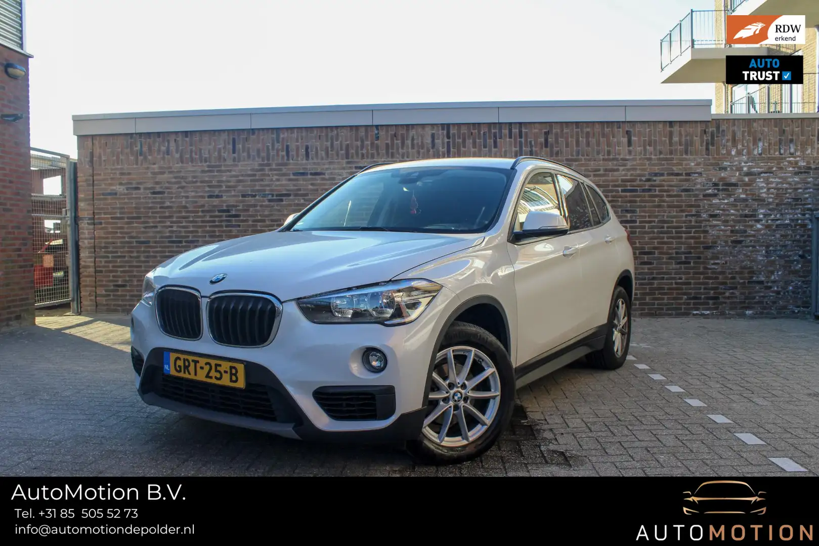 BMW X1 sDrive16d Executive | Parkeersonsoren | Aut. koffe Wit - 1