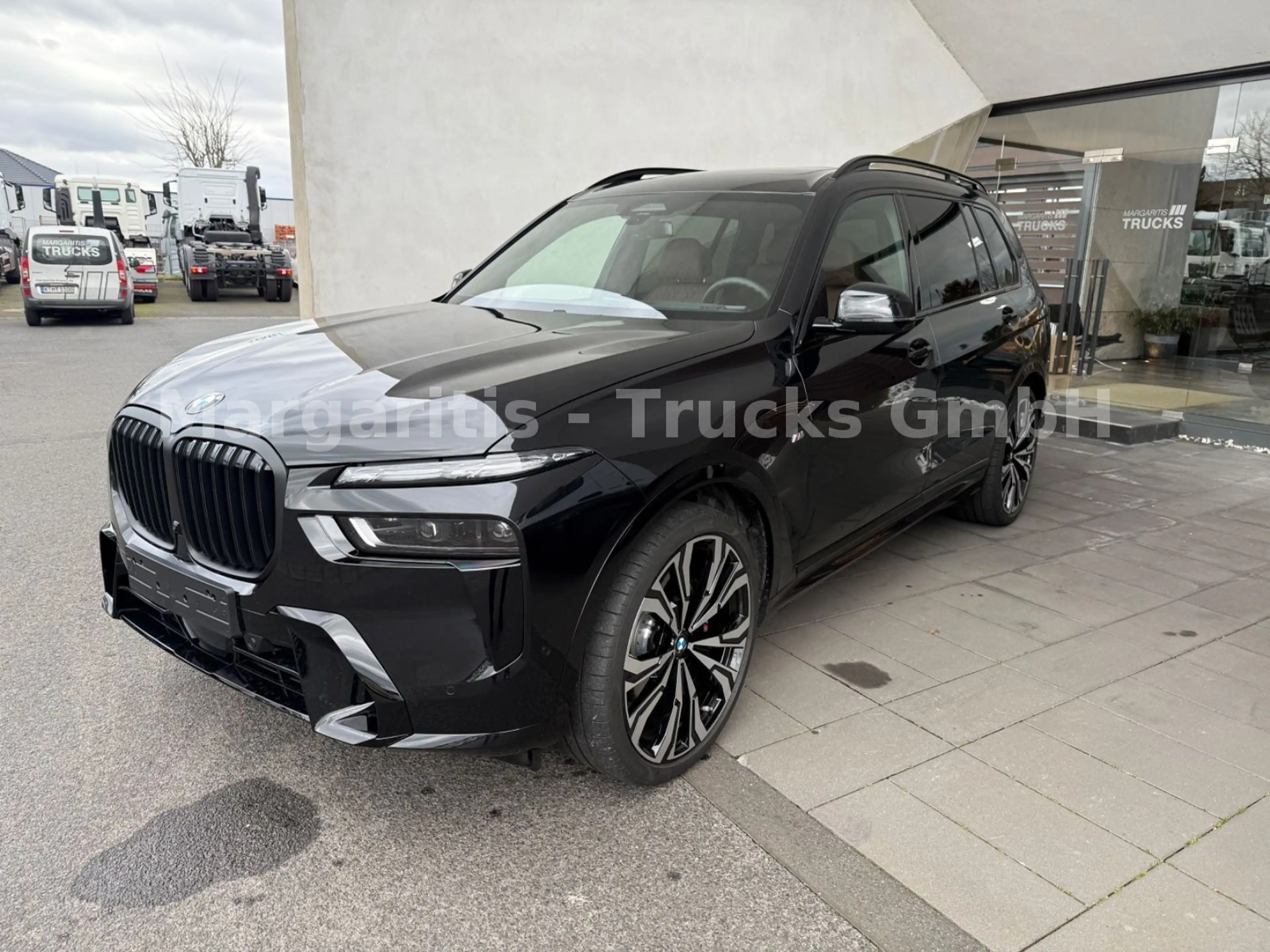 BMW X7 xDrive40d/MPaketPro/Pano/23"/H&K/Carbon — photo 3
