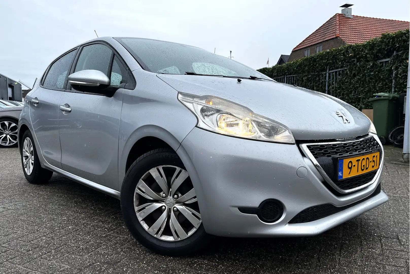 Peugeot 208 1.2 VTi Allure 5 deurs Navi/Cruise/Airco/Lmv 920 Grijs - 1