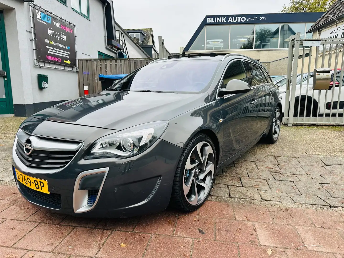 Opel Insignia Sports Tourer 2.8 T OPC 4x4 LPG G3 Garantie Apk Le Grijs - 1