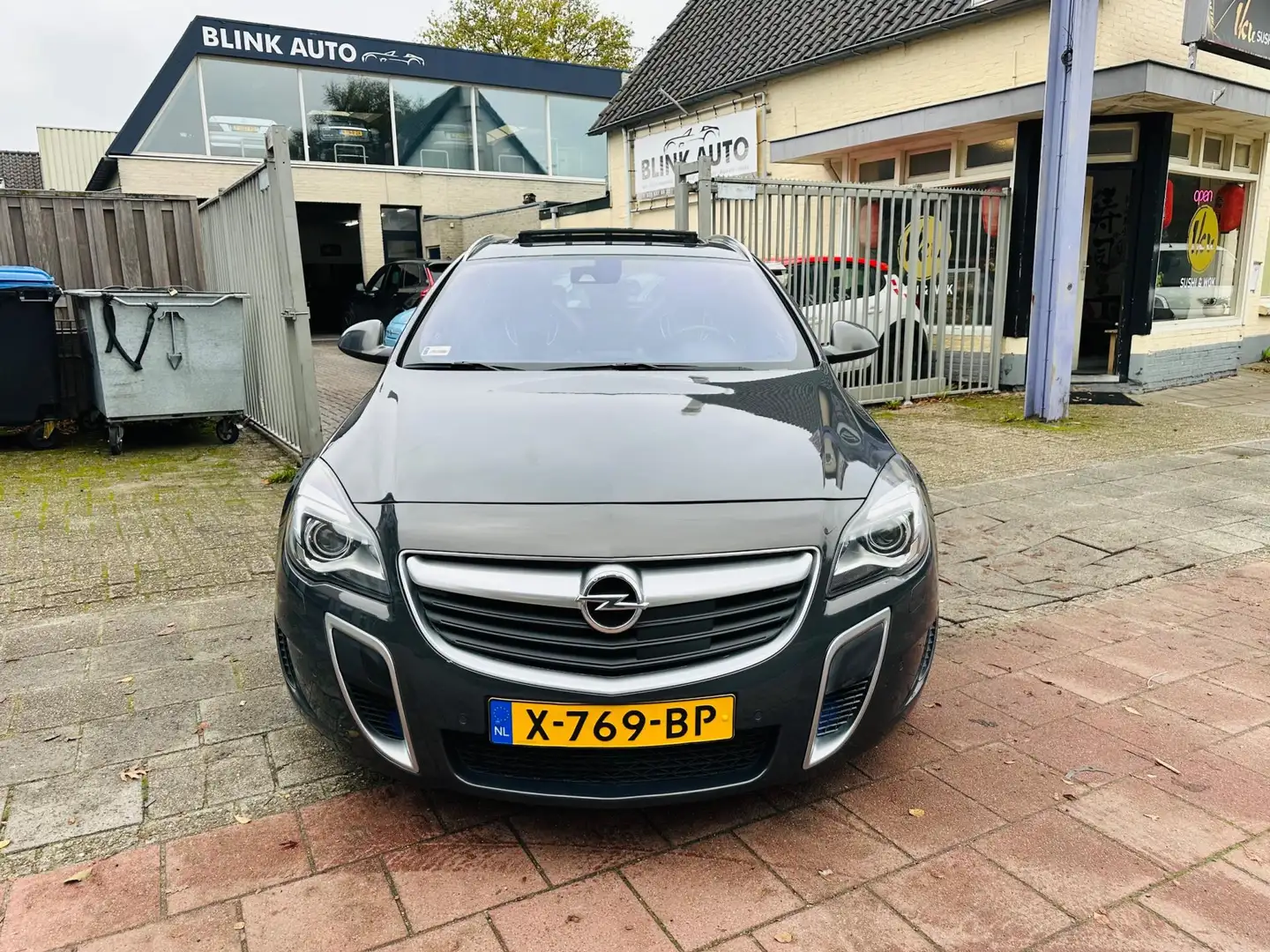 Opel Insignia Sports Tourer 2.8 T OPC 4x4 LPG G3 Garantie Apk Le Grijs - 2