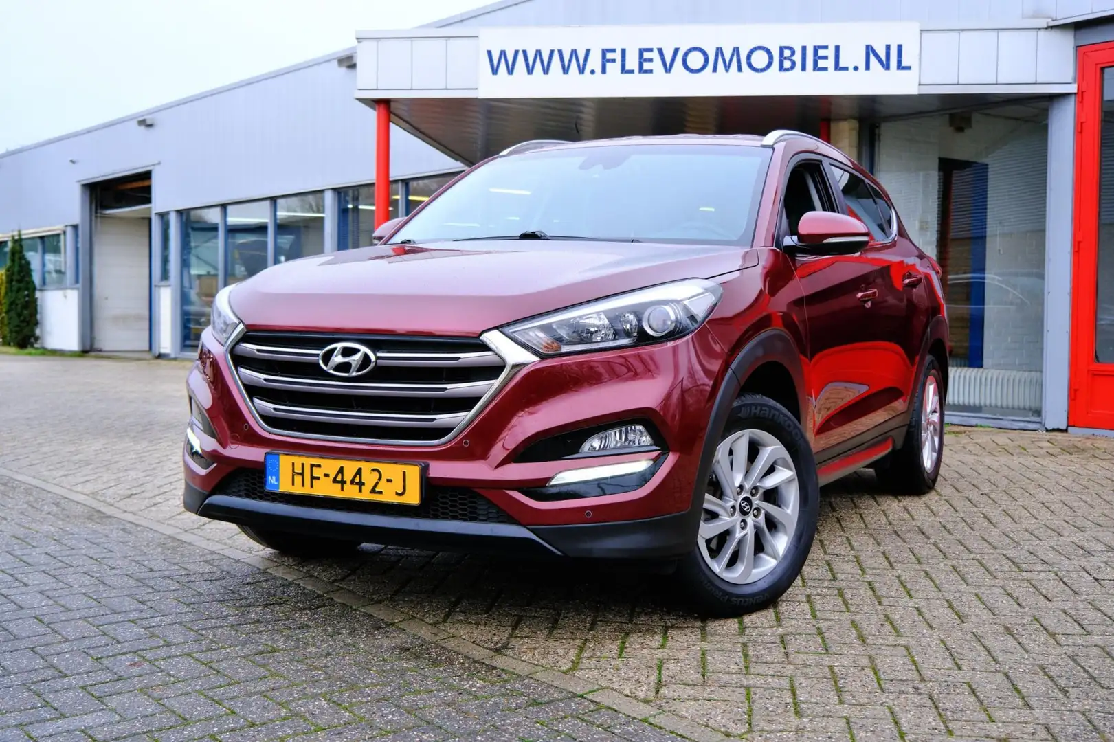 Hyundai TUCSON 1.6 GDi Comfort Navi|1e Eig|Cam|Clima|LMV Rood - 1