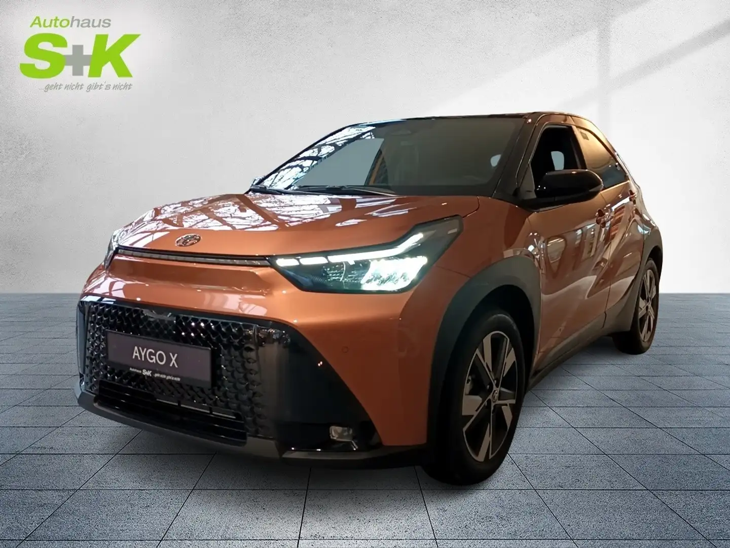 Toyota Aygo X 1,5 Hybrid Teamplayer*CARPLAY+SAFETYSENSE+LED* Brons - 1