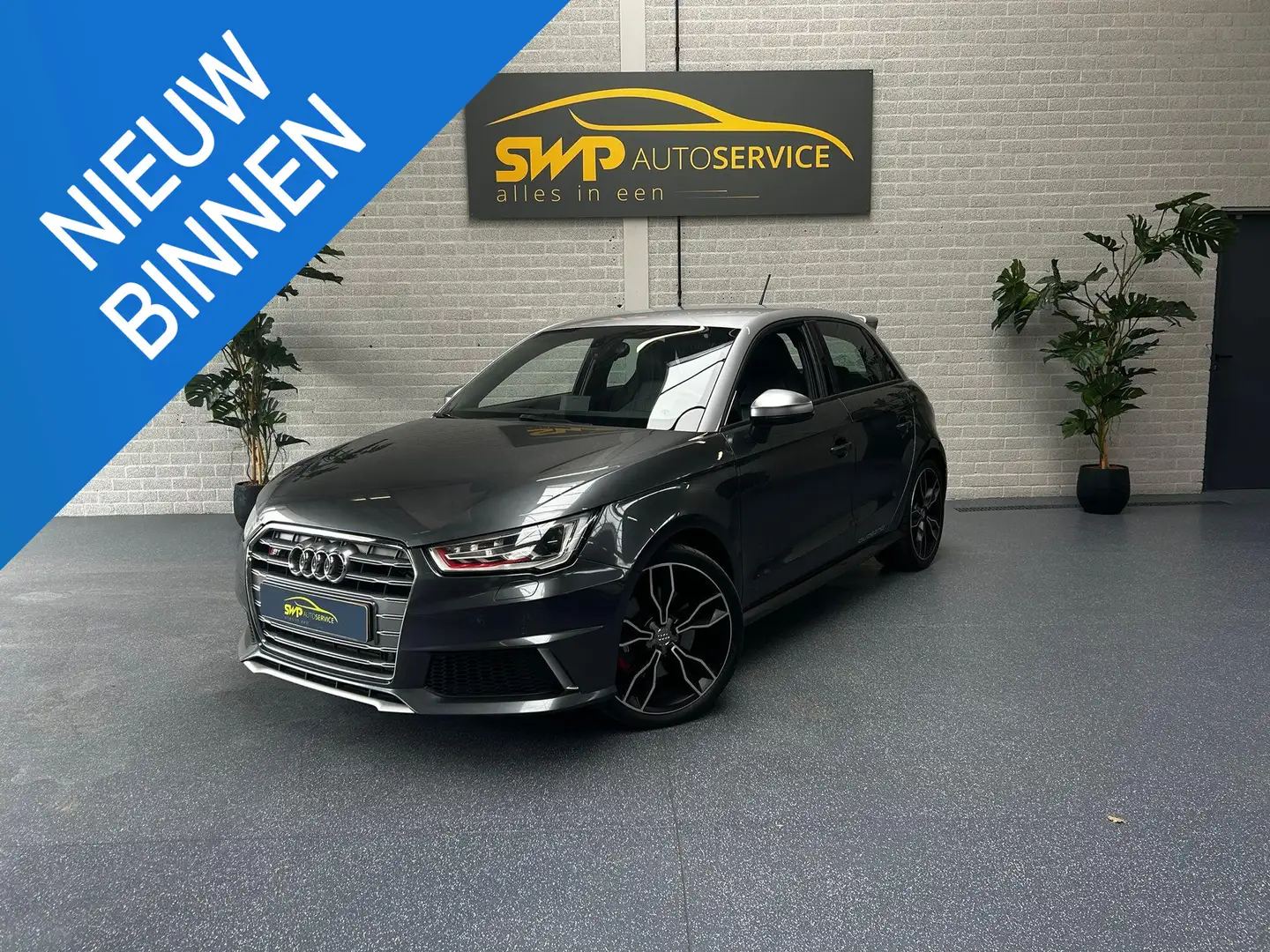 Audi A1 Sportback 2.0 TFSI S1 Quattro | Navi | Leer Grijs - 1
