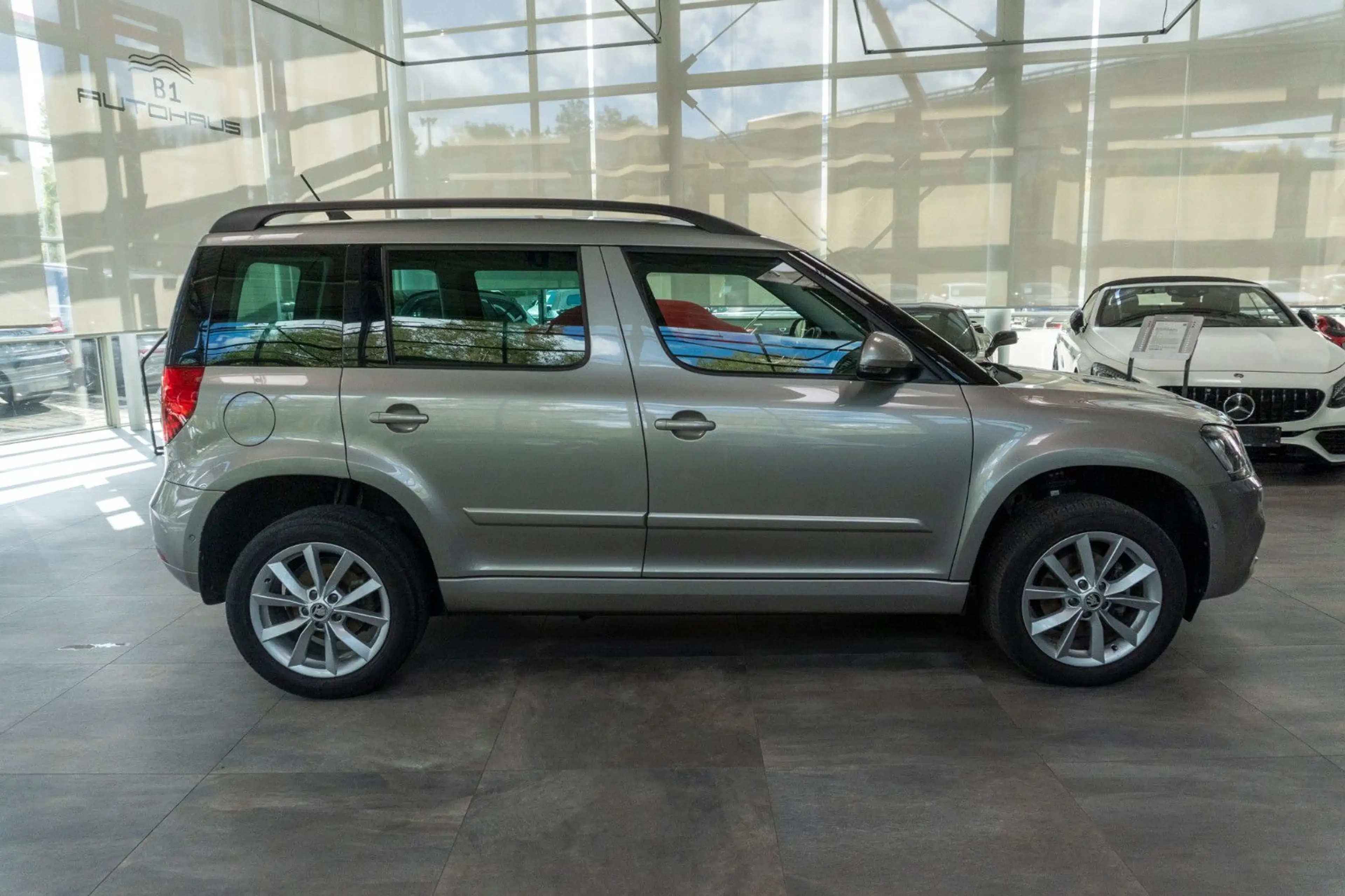 Skoda Yeti Style 4x4*AHK*KAM*PANO*DAB*NAVI*MEMORY — photo 4