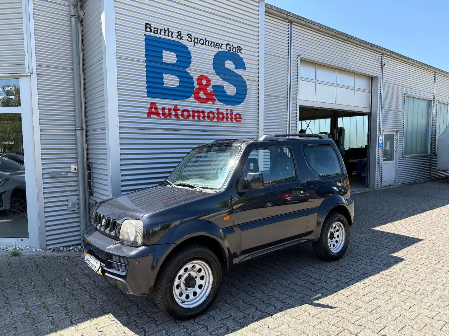Suzuki Jimny Club Lim. Grau - 1