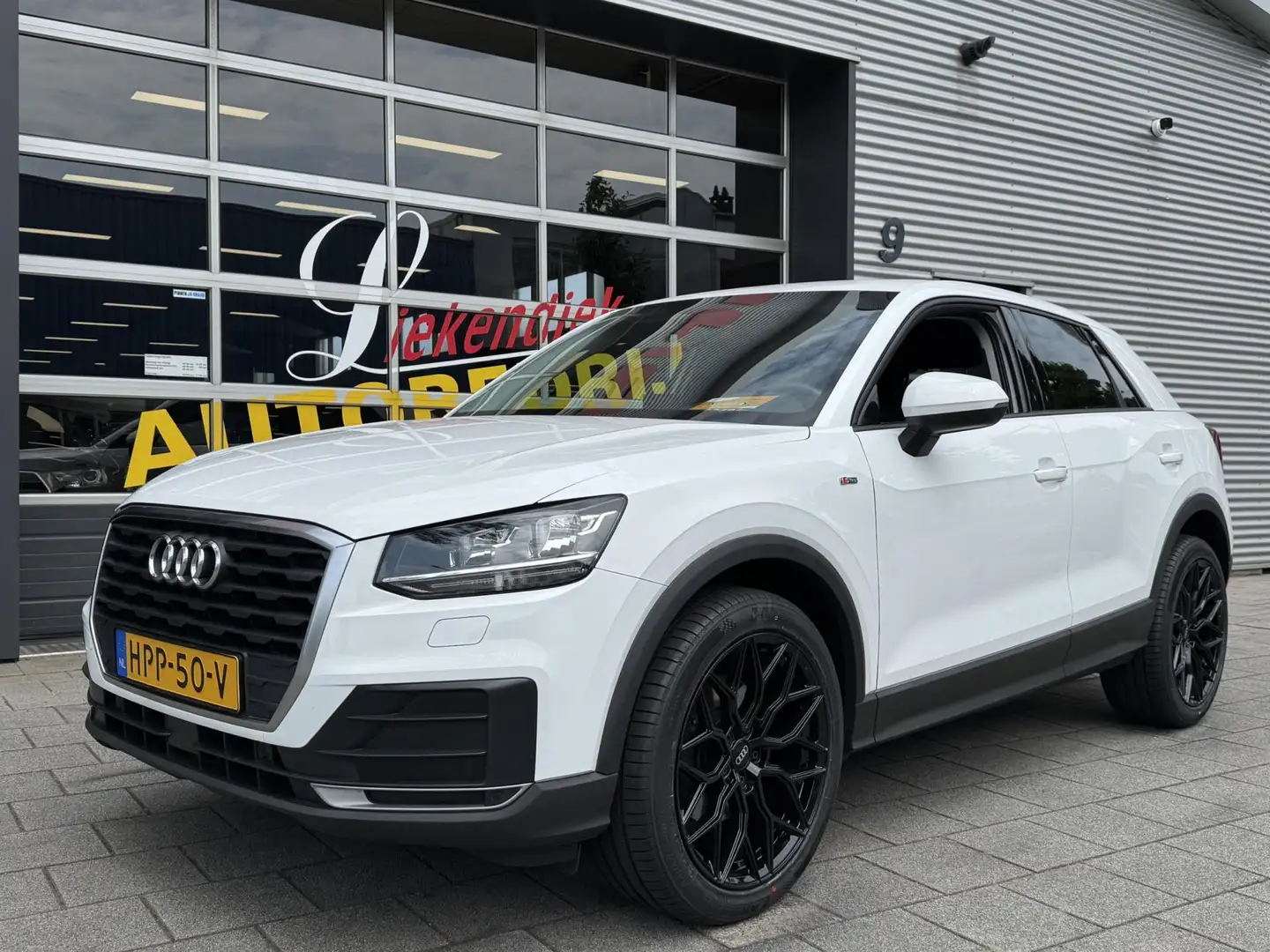 Audi Q2 30 TFSi Design - Navigatie I Airco I PDC I 19 inch Weiß - 1