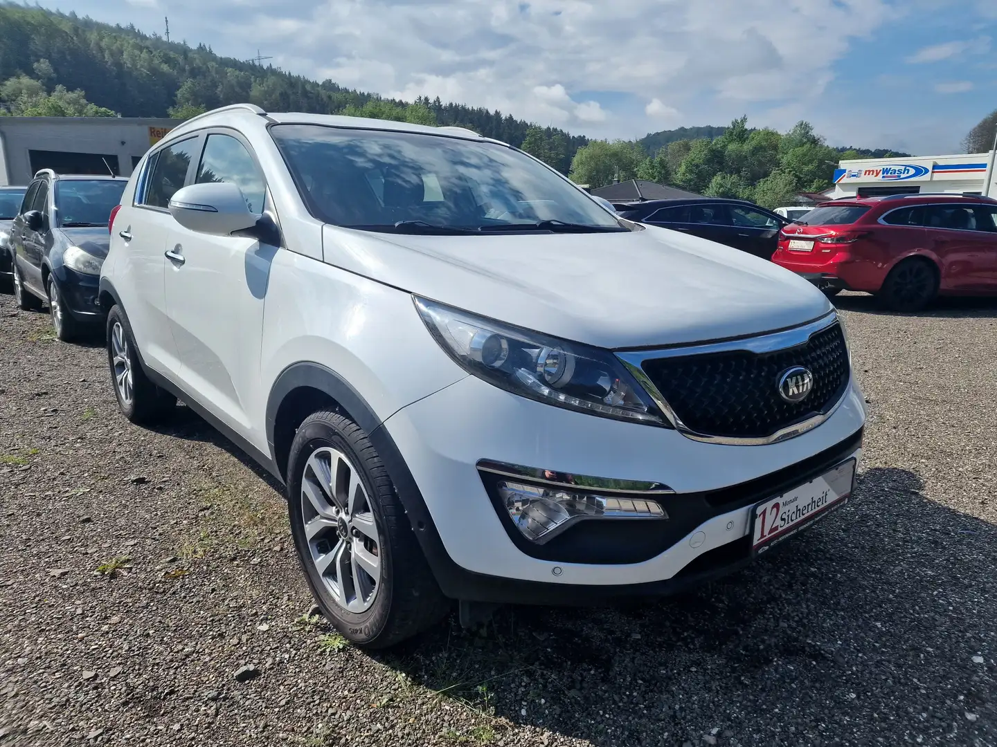 Kia Sportage Dream Team AHK-LEDER-NAVI-RÜCKFAHRKAMERA Weiß - 1