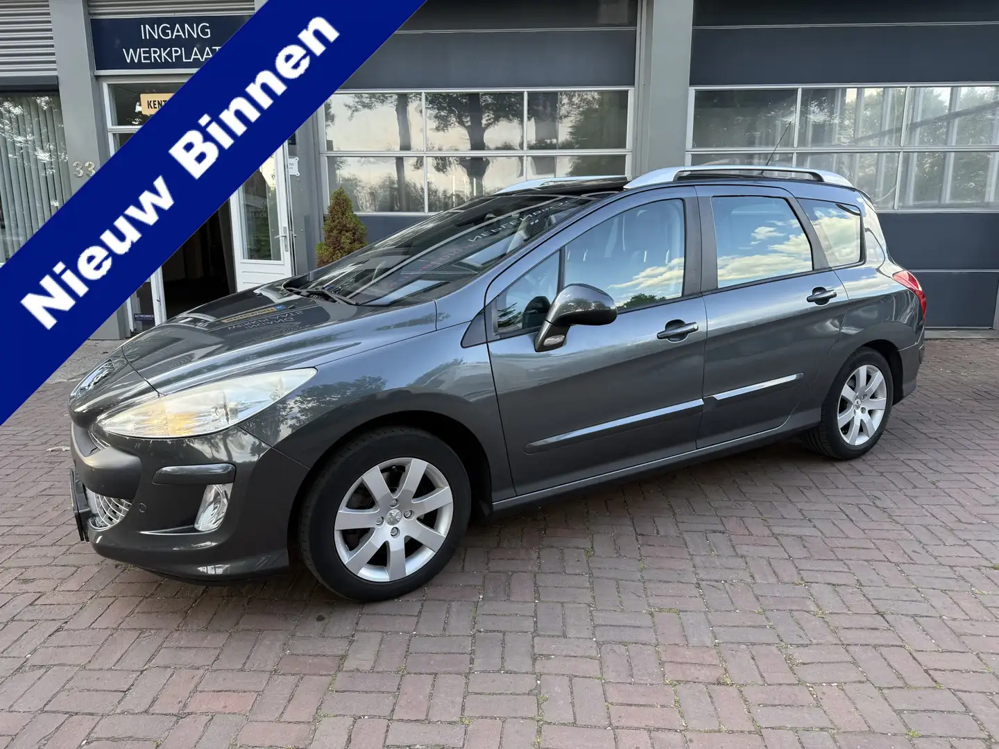 Peugeot 308 1.6 THP XT Leer,Pdc,Panodak,16Inch,Trekhaak Leuk b Grigio - 1