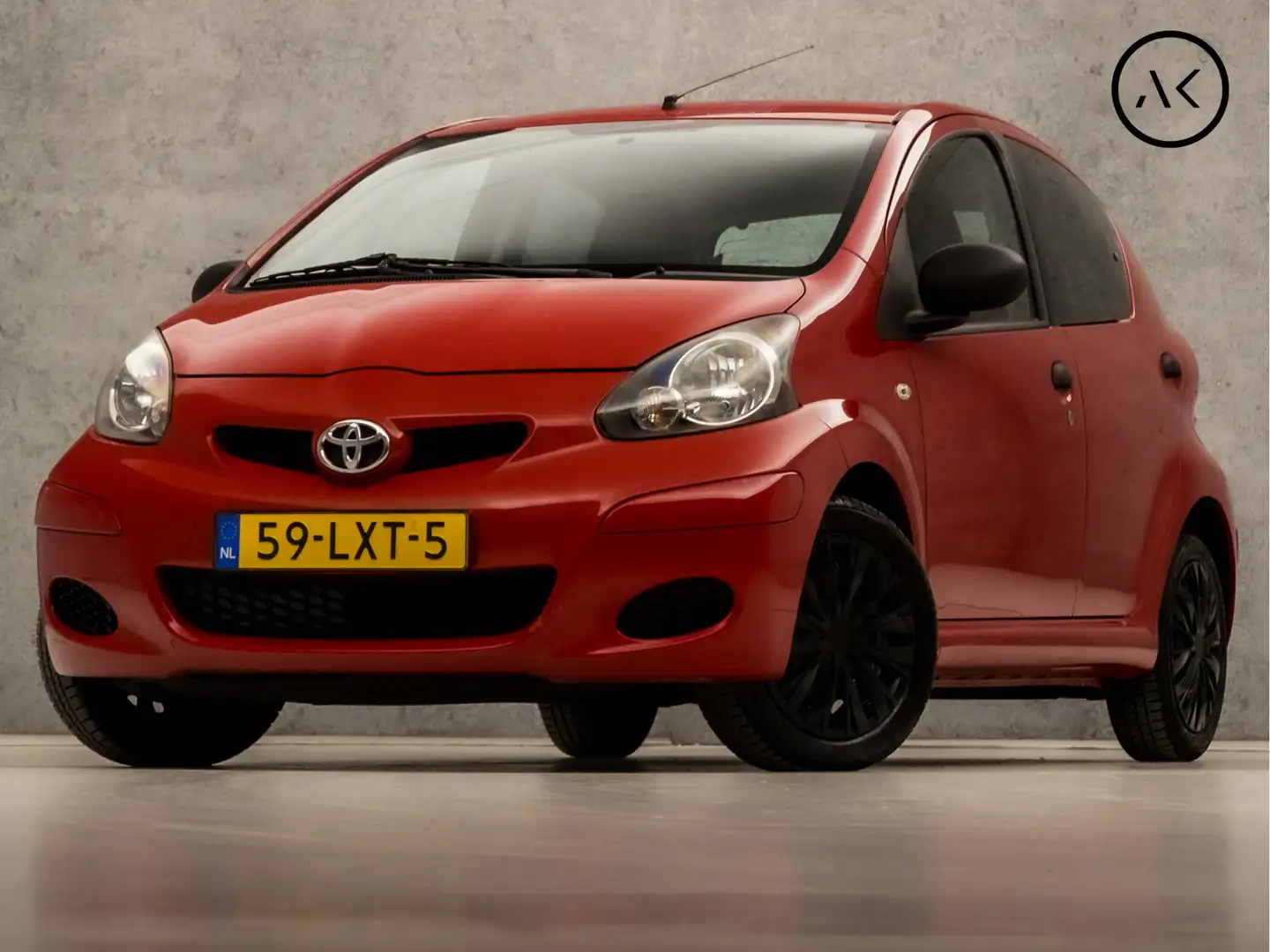 Toyota Aygo 1.0-12V Sport (5 DEURS, AIRCO, GETINT GLAS, SPORTS Rood - 1