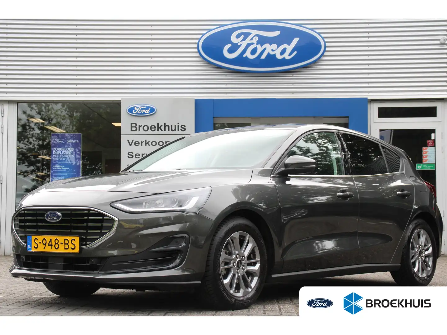 Ford Focus 1.0EB HYBRID TITANIUM | NL-AUTO! | 1 EIGENAAR! | G Grijs - 1
