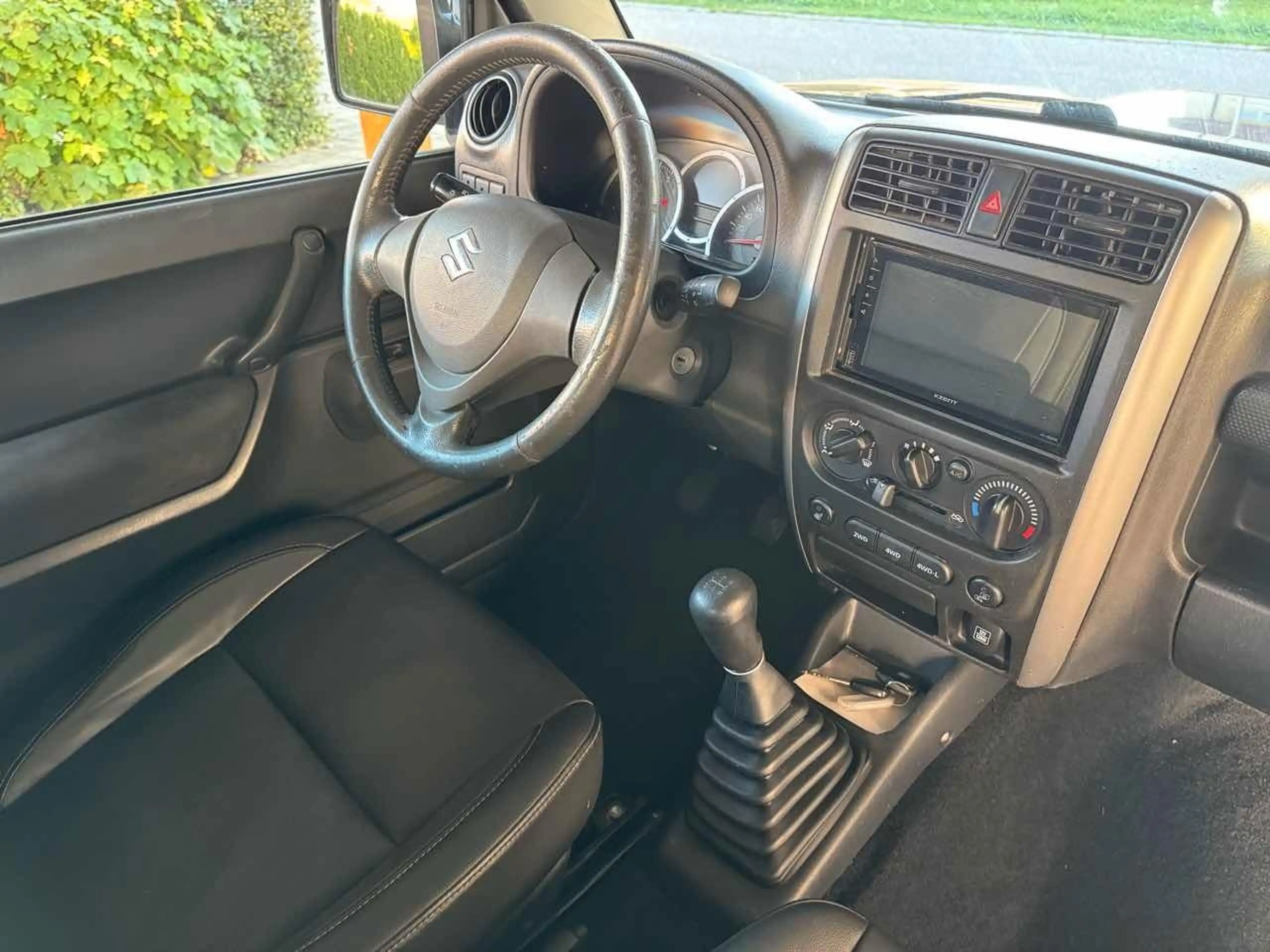 Suzuki Jimny 1.3 ALLGRIP Style Ranger — photo 12