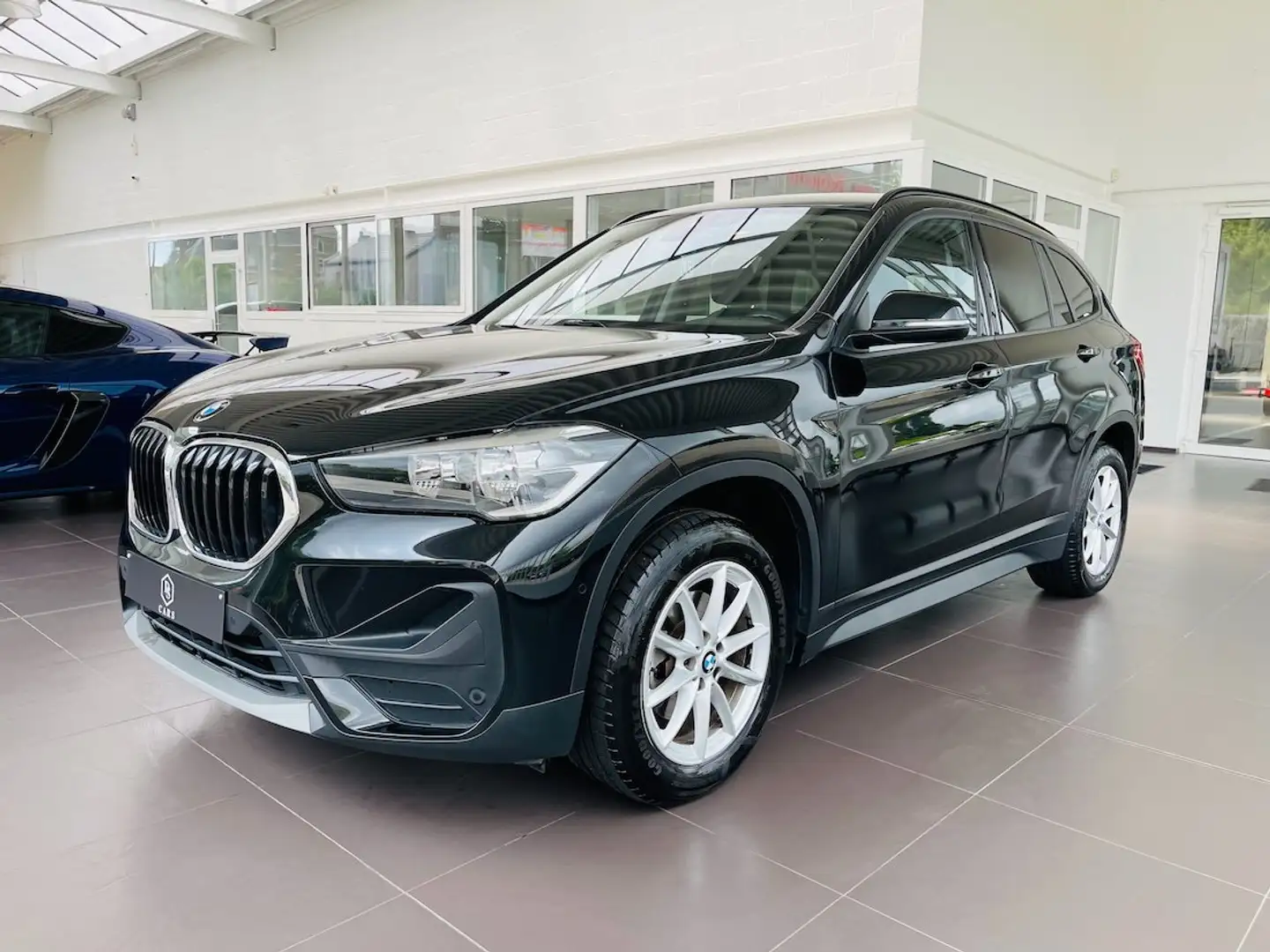 BMW X1 1.5i *** GARANTIE + GPS PRO + CAMERA *** Noir - 1