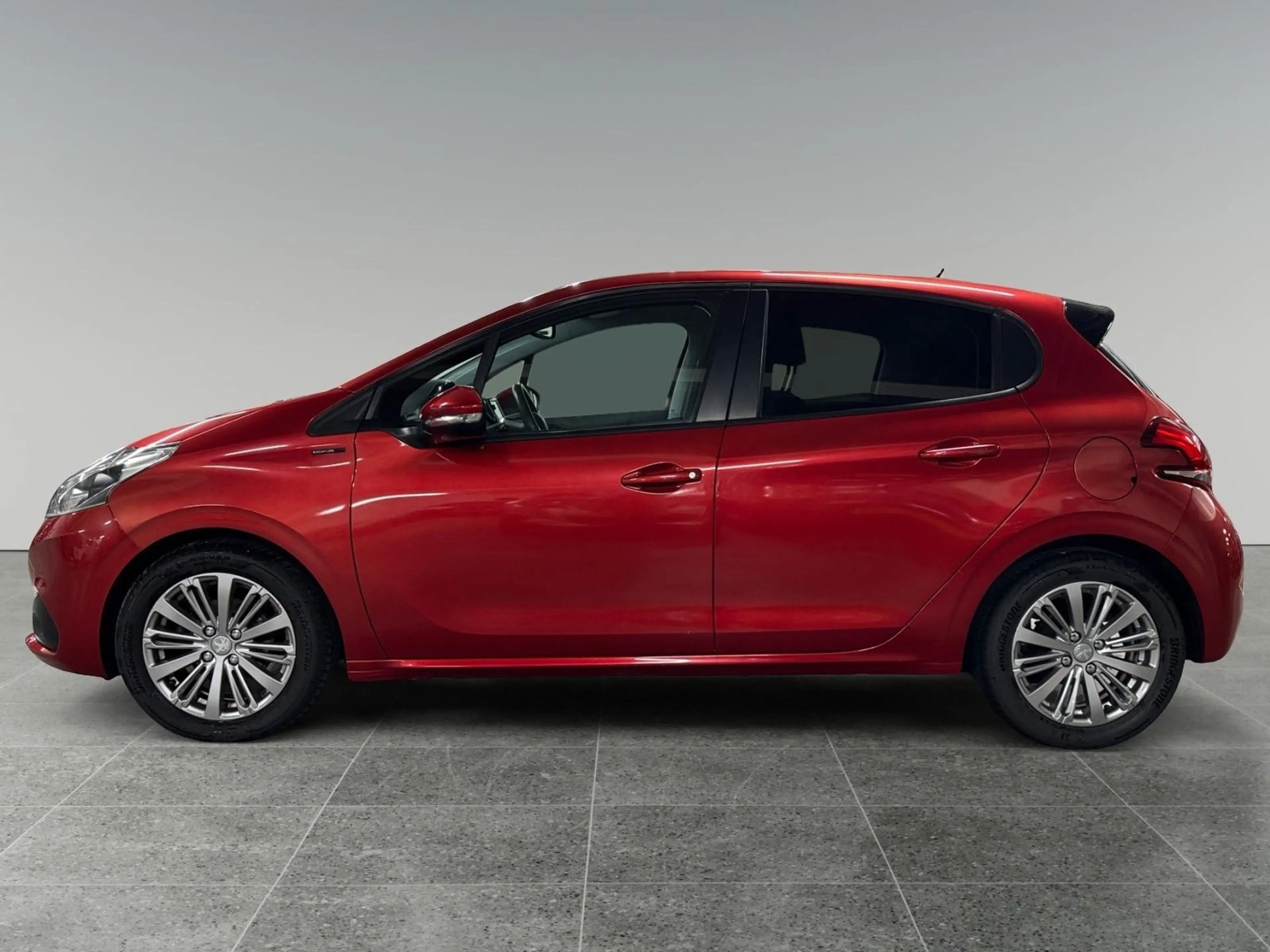 Peugeot 208 1.2 82pk Signature | AIRCO | NAVIGATIE | 16 INCH L — photo 2