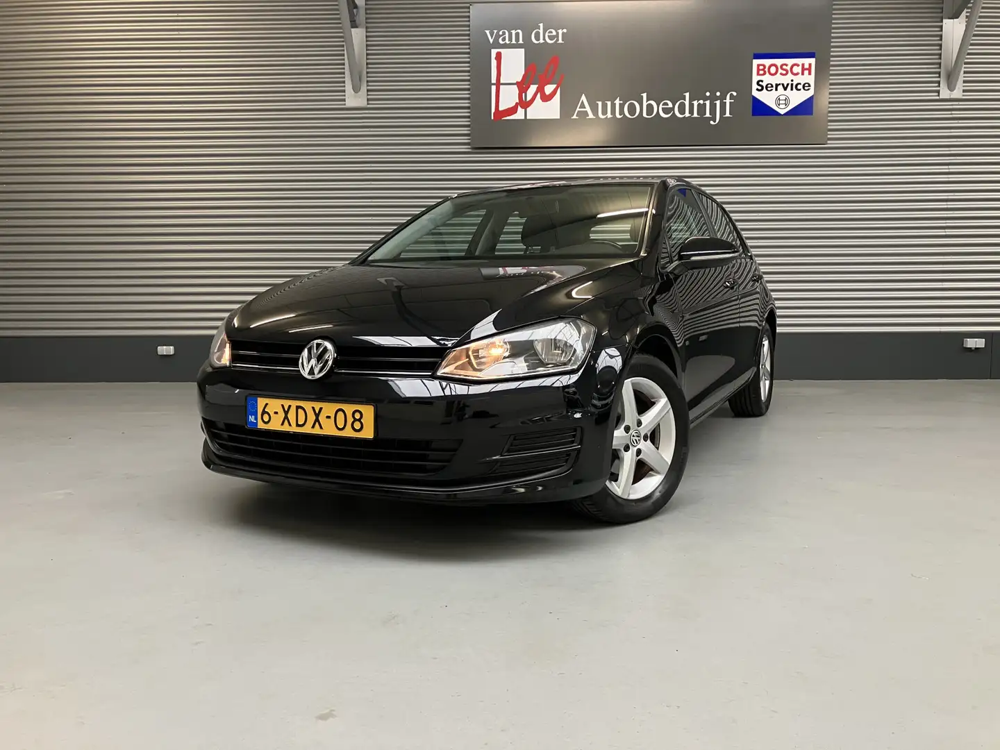 Volkswagen Golf 1.2 TSI 105 PK TRENDLINE/CRUISE/BC/NAVI/LMV 16 INC Zwart - 1