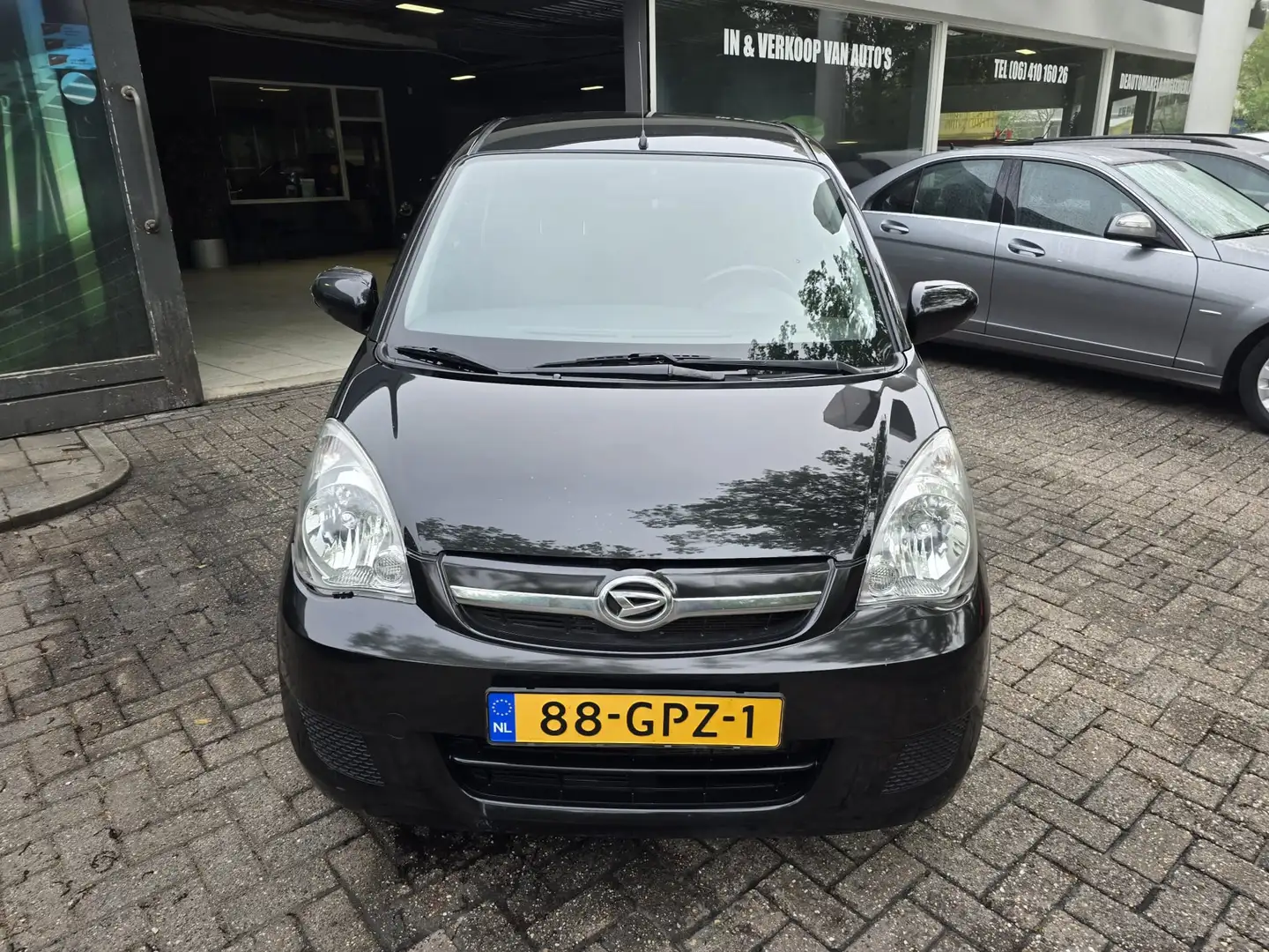 Daihatsu Cuore 1.0 Premium | 1E EIGENAAR | 12MND GARANTIE | AIRCO Schwarz - 2