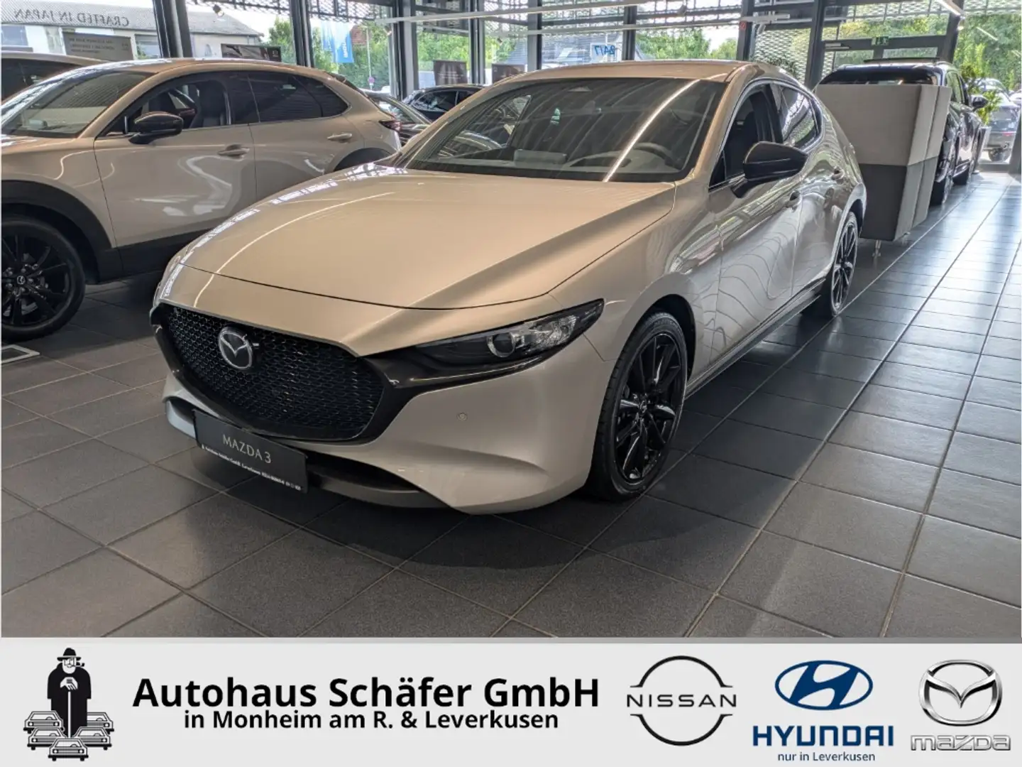 Mazda 3 (2025) HOMURA e-Skyactiv-G 140PS 6MT HUD Navi LED Brun - 1