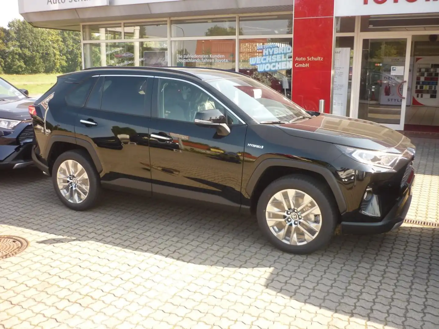 Toyota RAV 4 2.5 Hybrid AT e4x4 Lounge + Navi + AHK Schwarz - 1