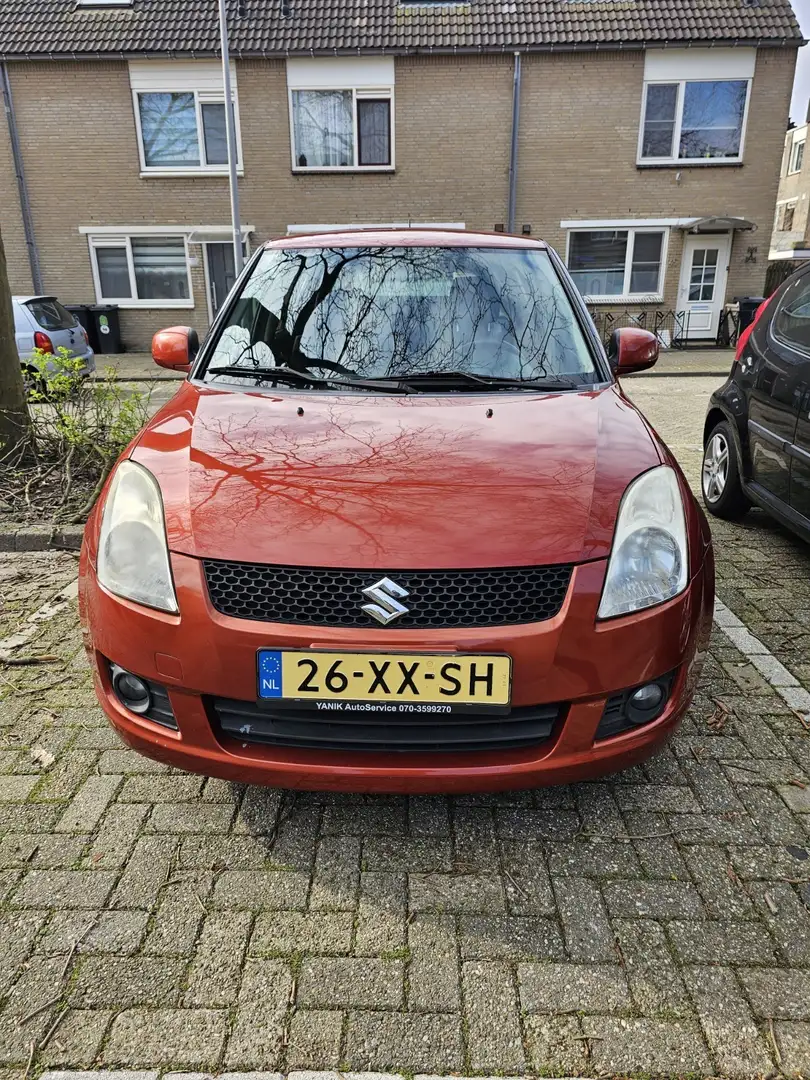 Suzuki Swift 1.3 Shogun Hatchback Oranje - 1