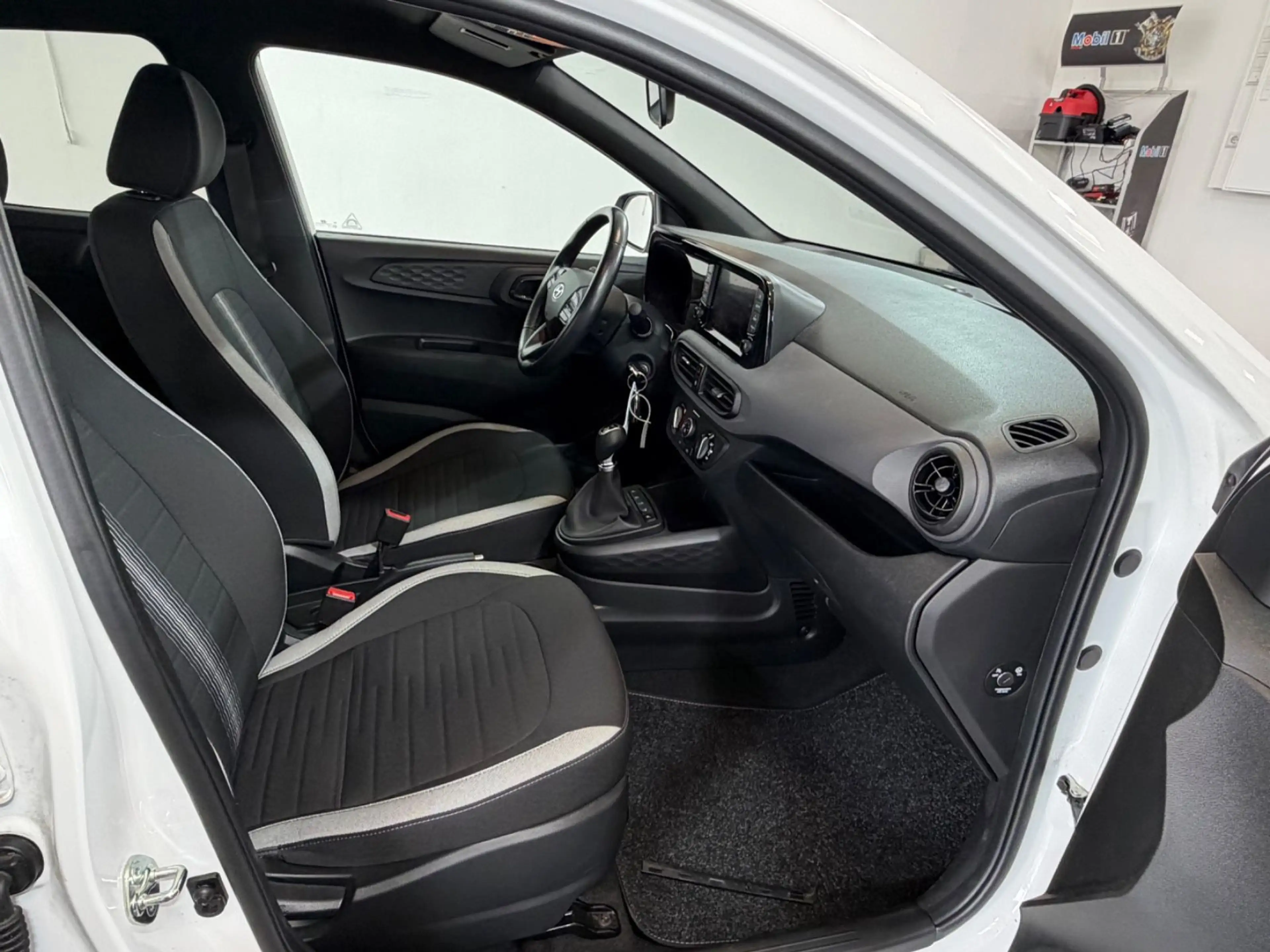 Hyundai i10 Connect & Go/Kamera/1-Hand/PDC/Tempomat/DAB — photo 12