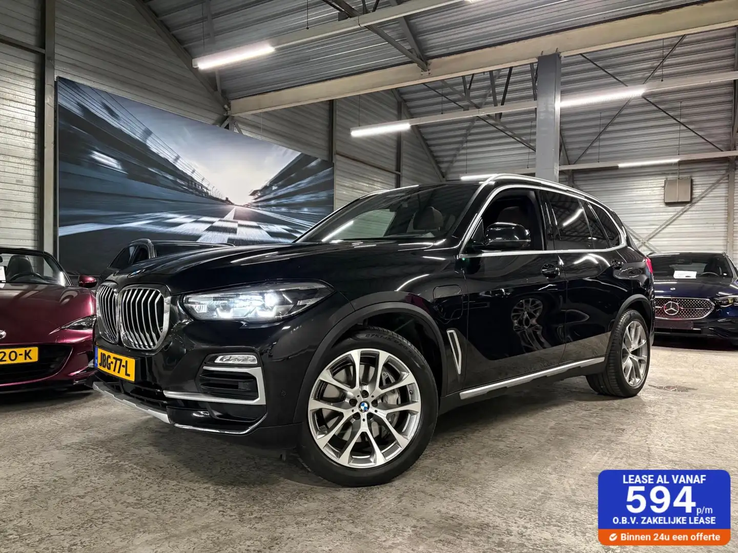 BMW X5 xDrive45e High Executive | Pano | HUD | Trekhaak Schwarz - 1