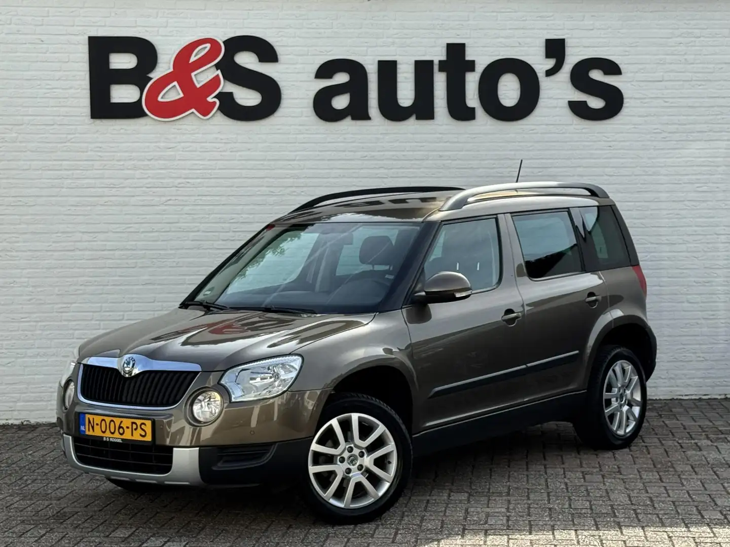 Skoda Yeti 1.2 TSI Ambition 100% onderhouden Clima Cruise DAB Bruin - 1