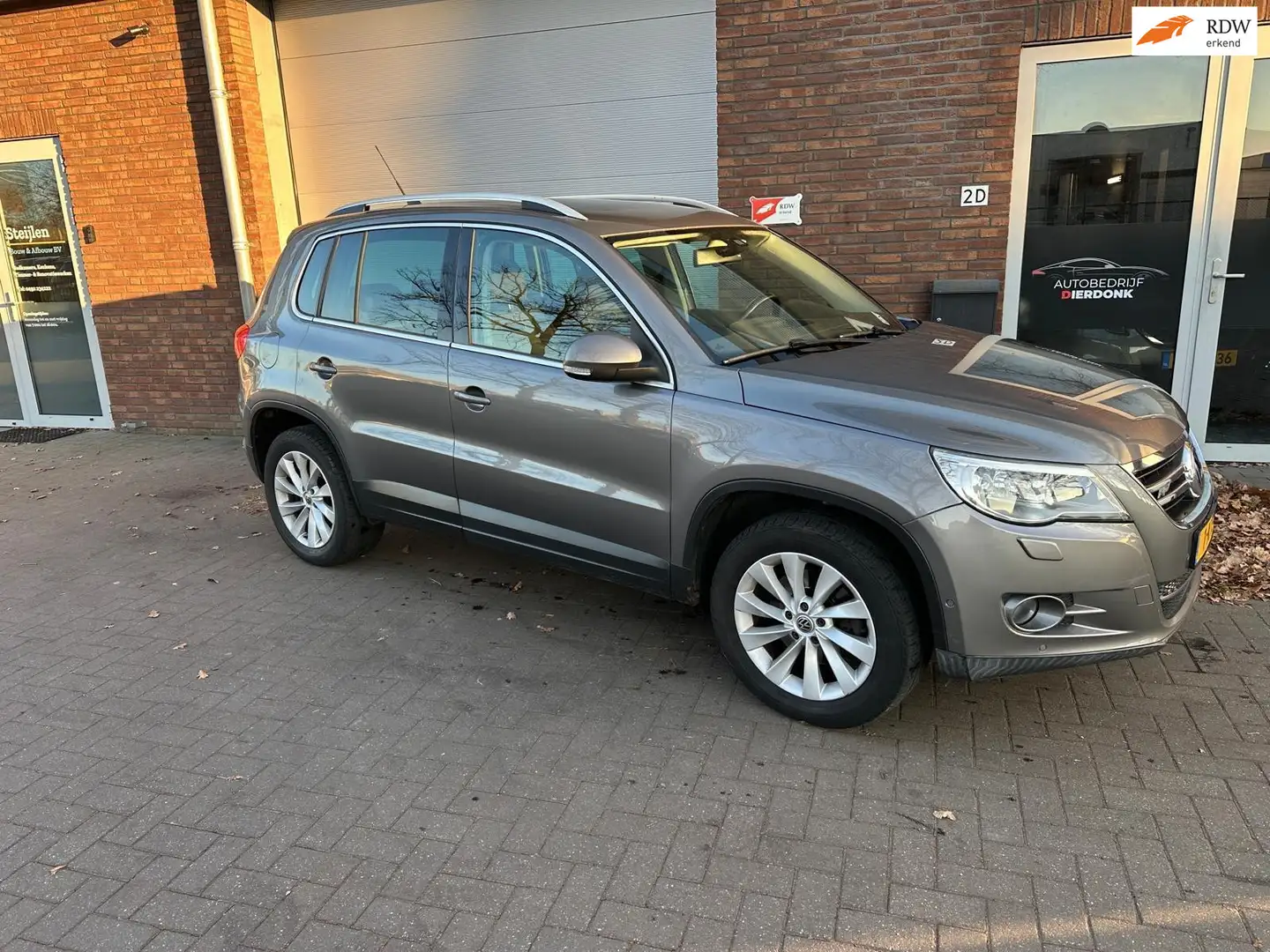 Volkswagen Tiguan 2.0 TSI Sport&Style 4Motion|AUTOMAAT|PANO|R-LINE Gris - 1