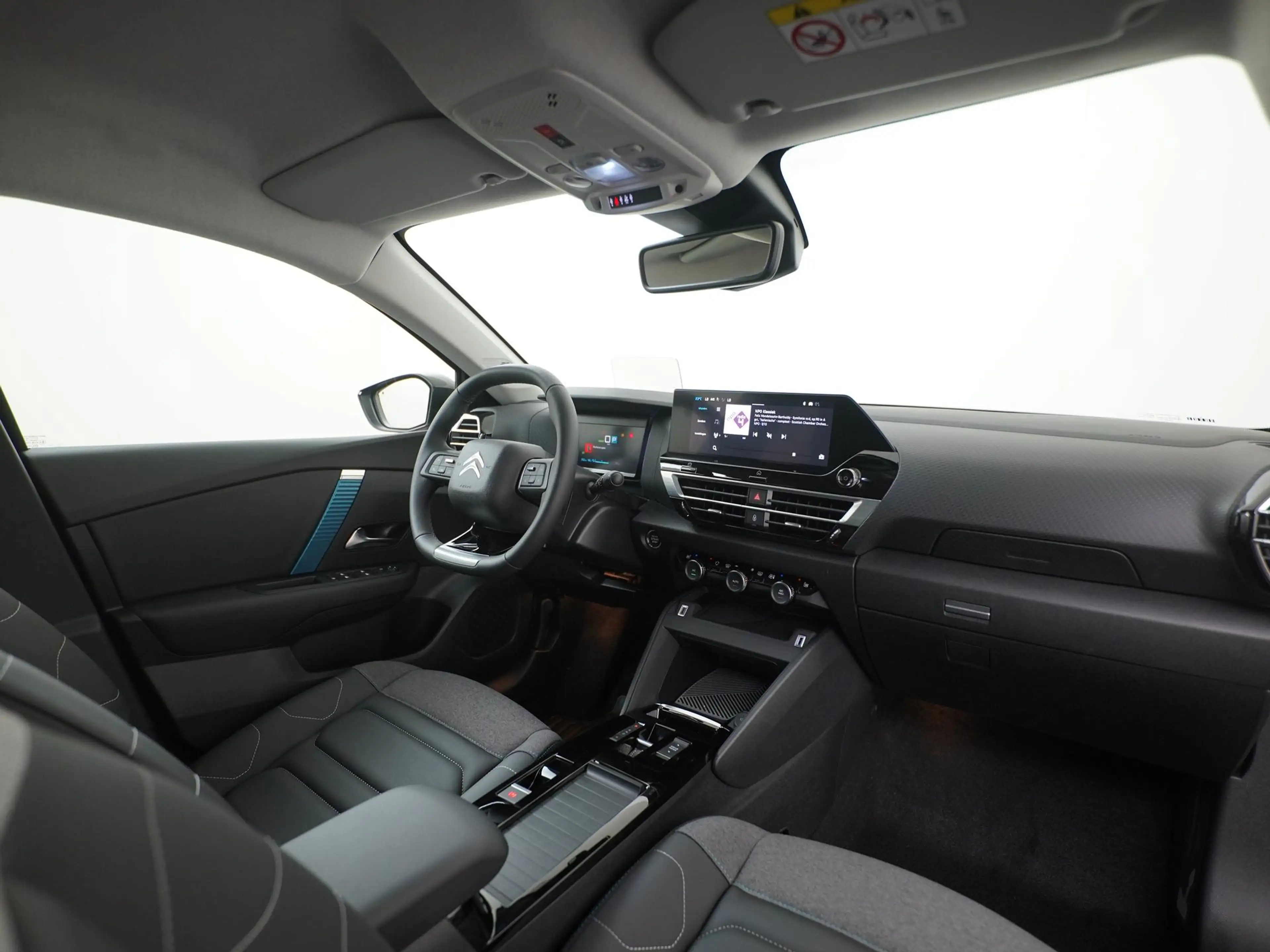 Citroen E-C4 X Ë-C4X Shine 50 kWh | SOH 100% | Panoramadak | Head — photo 2