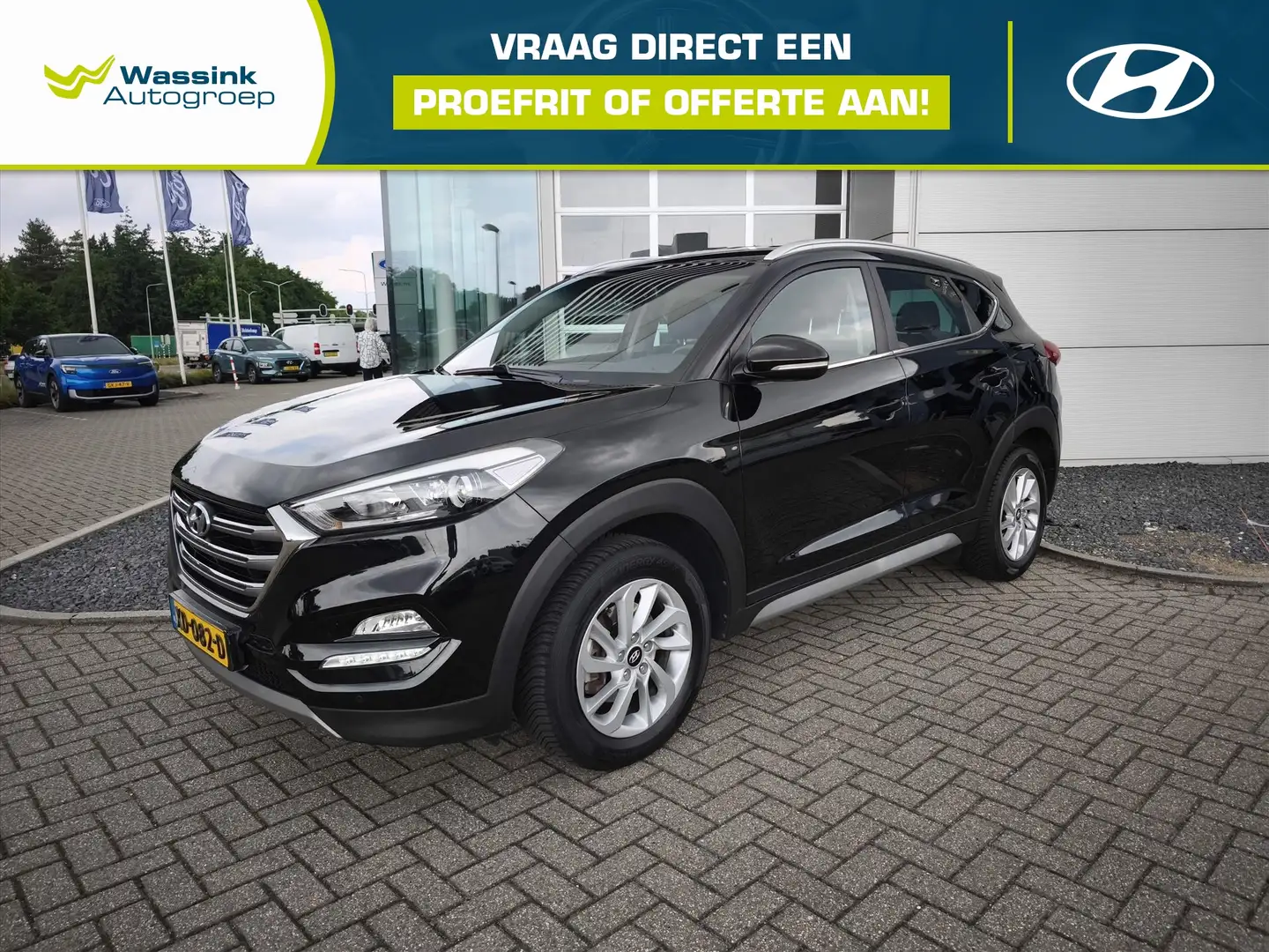 Hyundai TUCSON 1.6 GDi 132pk Comfort Smart | Camera | LM Velgen | Zwart - 1