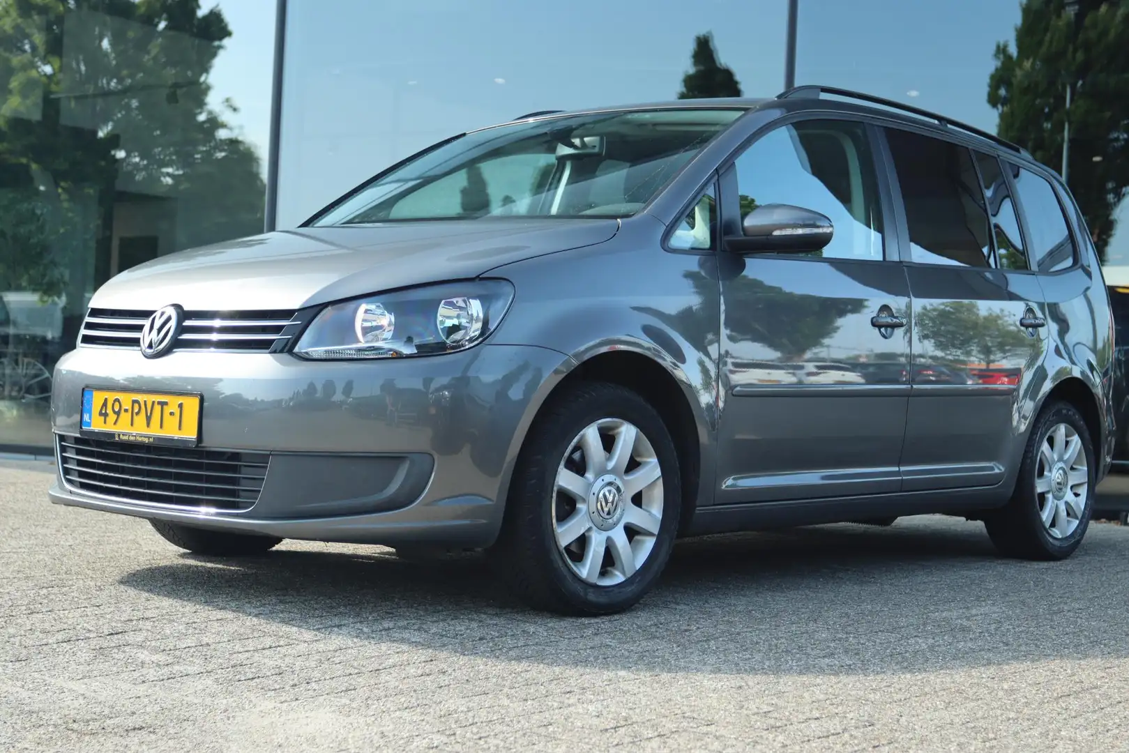Volkswagen Touran 1.2 TSI COMFORTLINE BLUEMOTION 1E EIG. ORIG. NL | Grau - 1