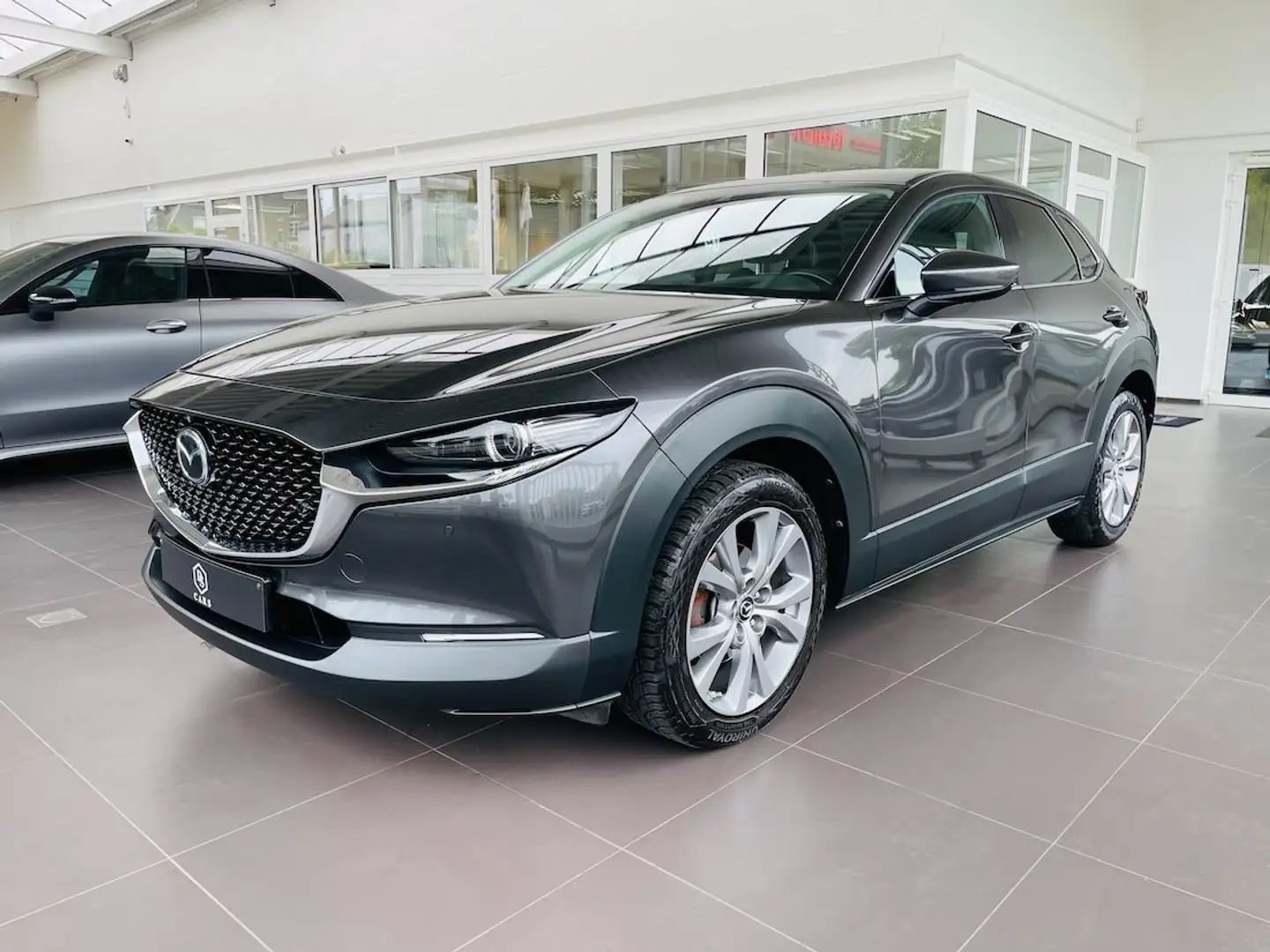 Mazda CX-30 2.0i *** GARANTIE + LED + GPS + AIRCO *** Grijs - 1