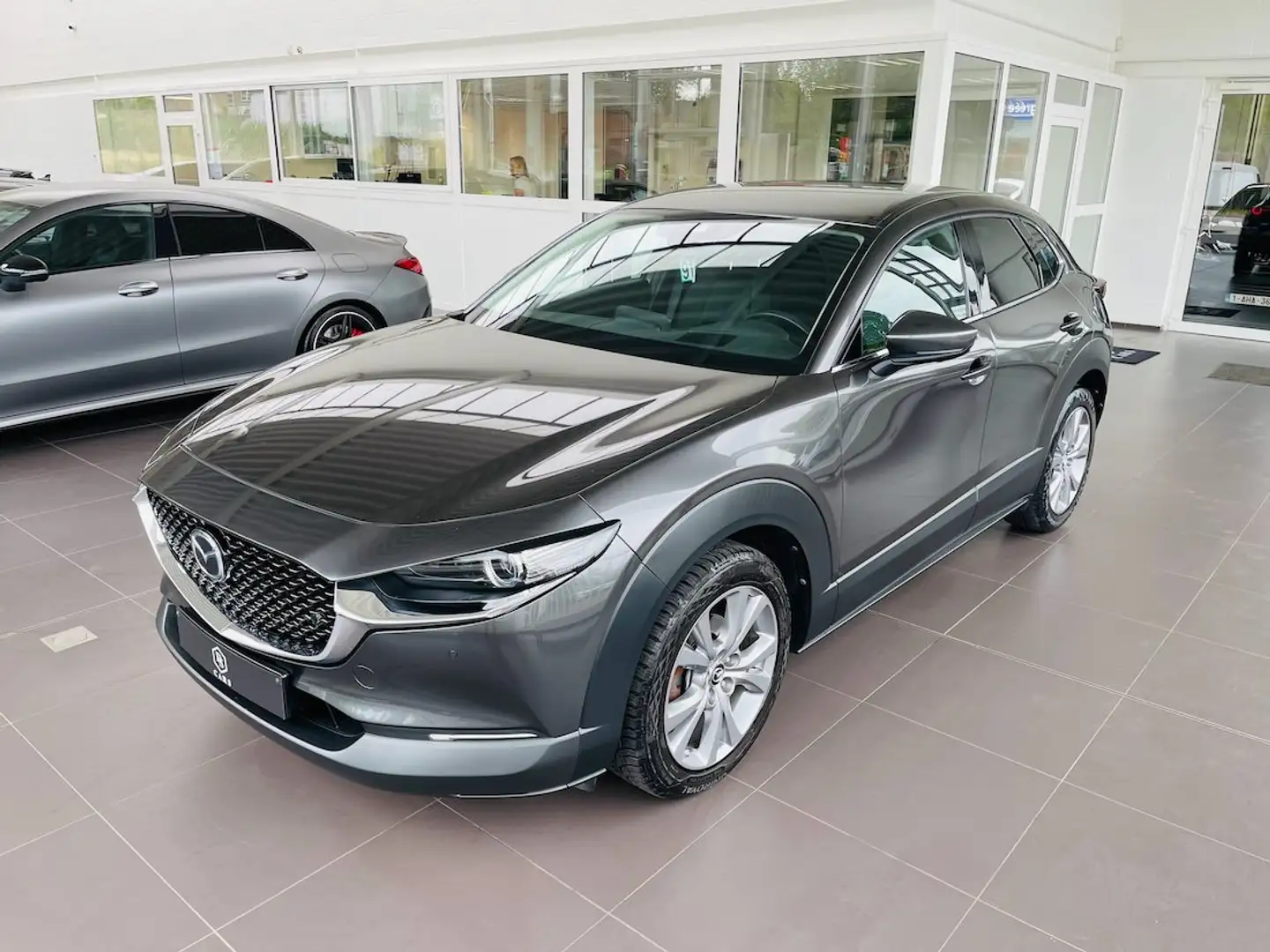 Mazda CX-30 2.0i *** GARANTIE + LED + GPS + AIRCO *** Grijs - 2