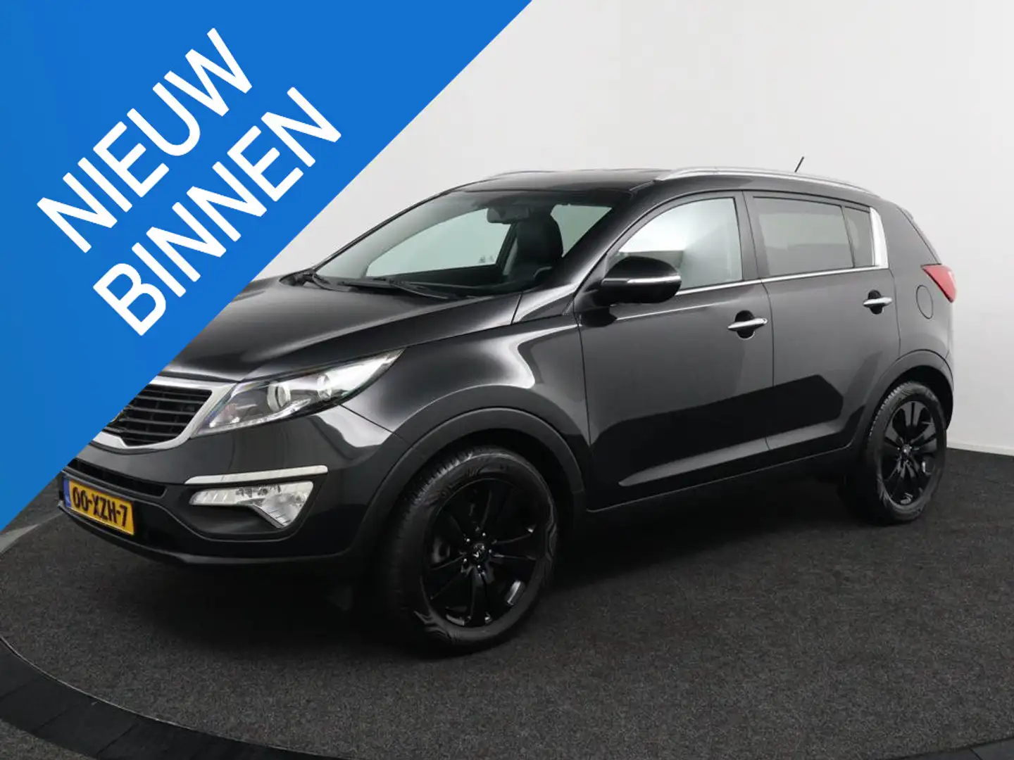 Kia Sportage 2.0 X-ecutive Plus Pack Zwart - 1