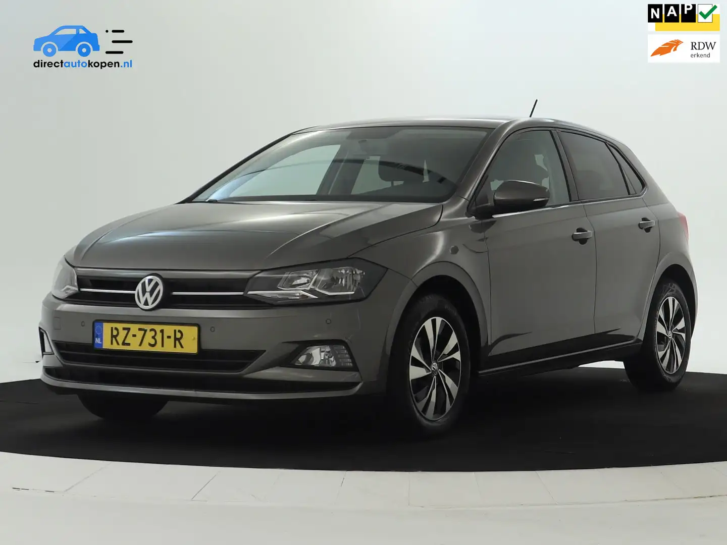 Volkswagen Polo 1.0 TSI Comfortline Business NAVI | CarPlay | PDC Grijs - 1
