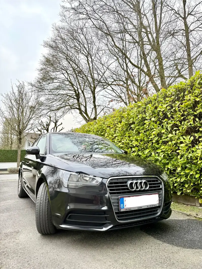 Audi A1 1.6 TDI Sportback Attraction Noir - 1