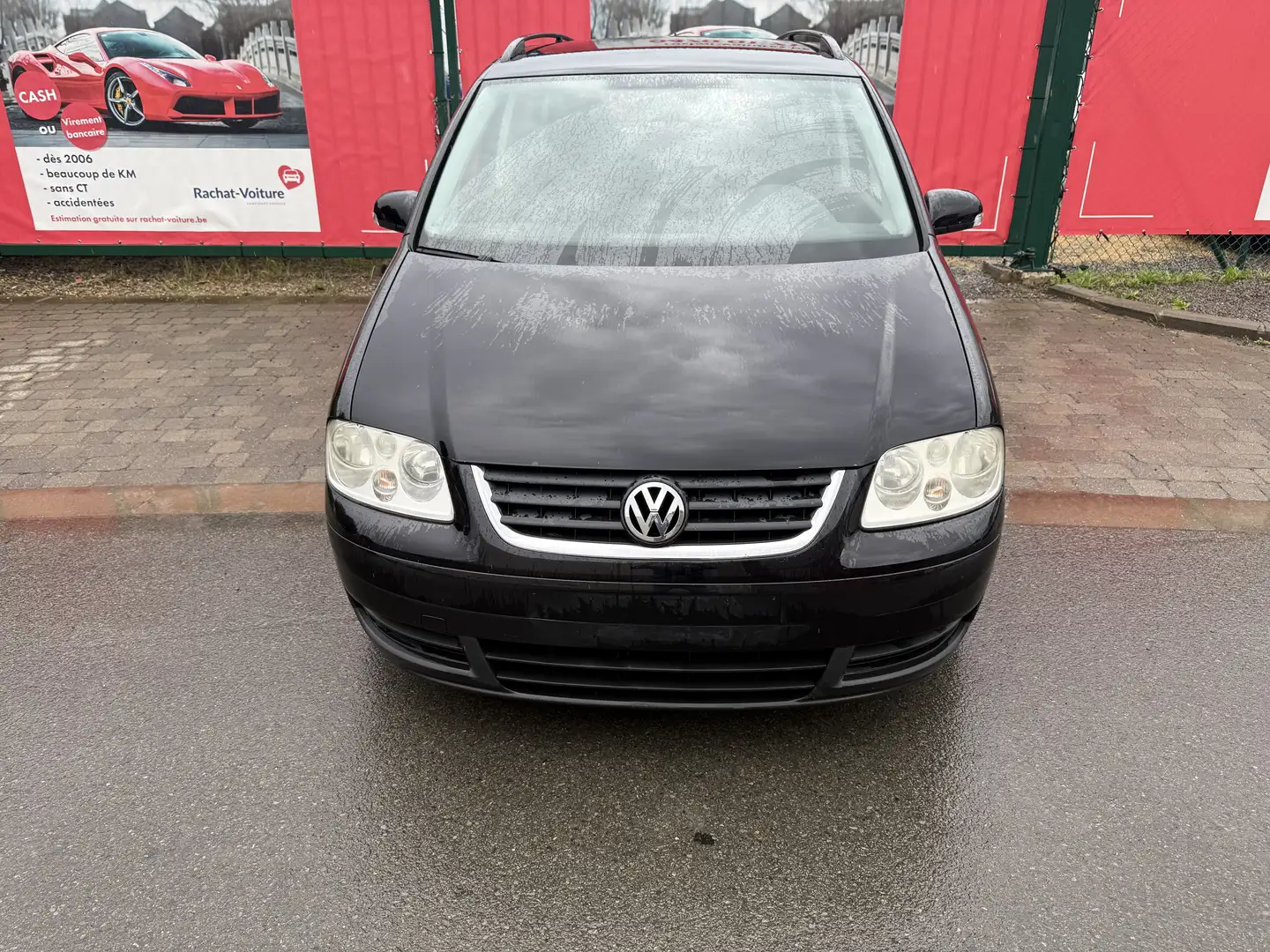 Volkswagen Touran 1.9 TDi Highline DSG - 1