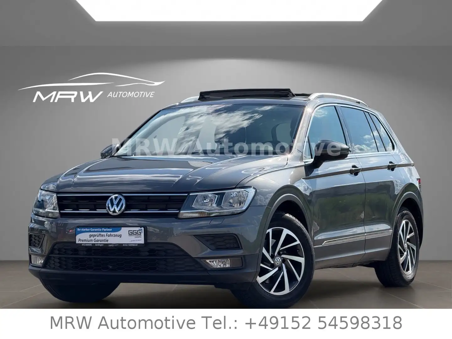 Volkswagen Tiguan Sound*ACC*PANO*PDC*NAVI*VIRTUAL*1HAND Grijs - 1