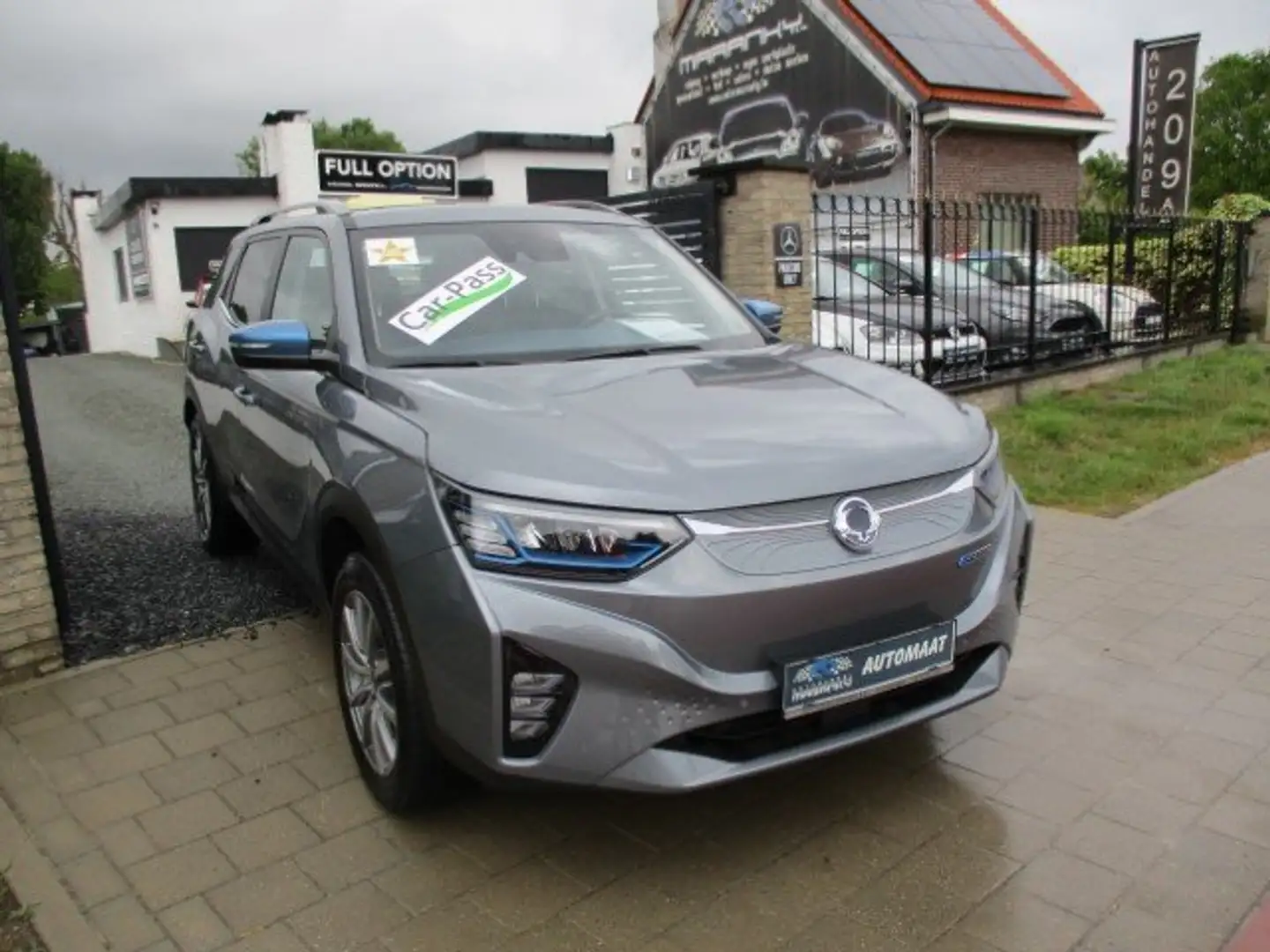 SsangYong Korando Korando E-Motion EV TITANIUM FULL OPTION AUTOMAAT Gris - 1