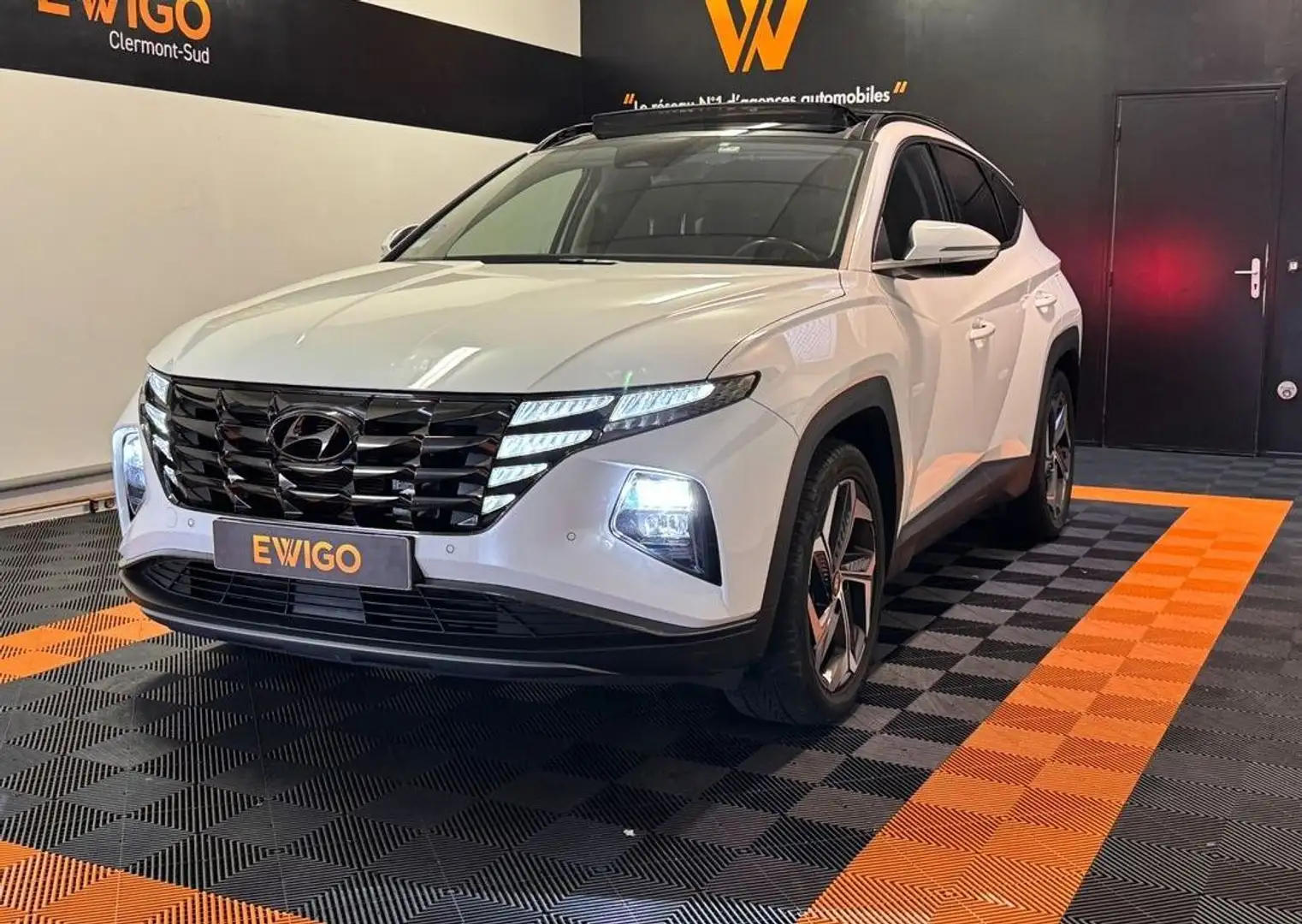 Hyundai TUCSON 1.6 t-gdi 265h 180 hybrid phev 13.8kwh creative htrac 4wd bva-toit panoramique-attelage Weiß - 1