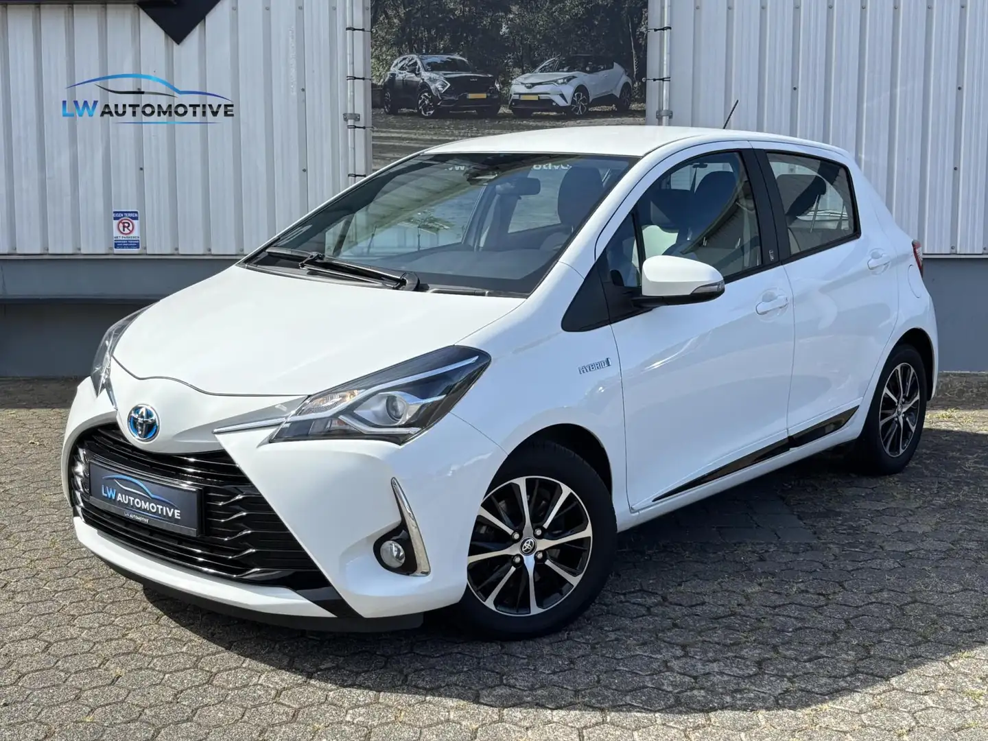 Toyota Yaris 1.5 Hybrid Design | Navigatie | Camera | 15 inch Wit - 1