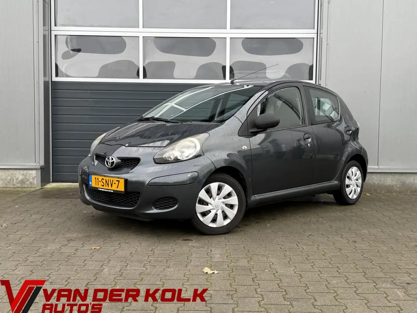 Toyota Aygo 1.0-12V Comfort | 5 Deurs | Airco | Elektrische Ra Grijs - 1